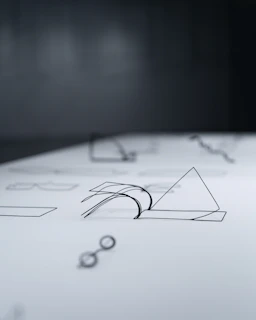 A close up of a piece of paper with a pen on it