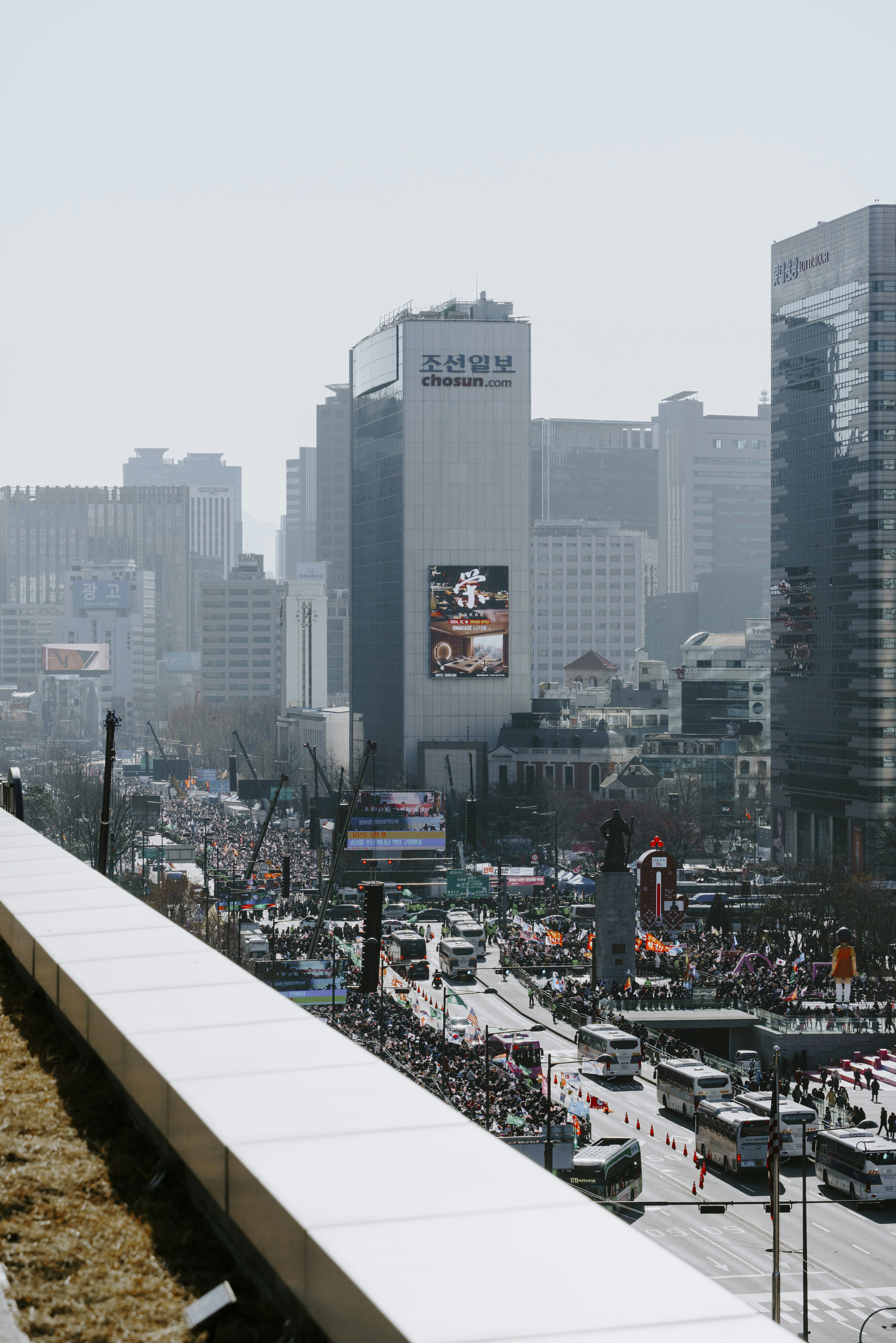 A man riding a skateboard down the side of a ramp