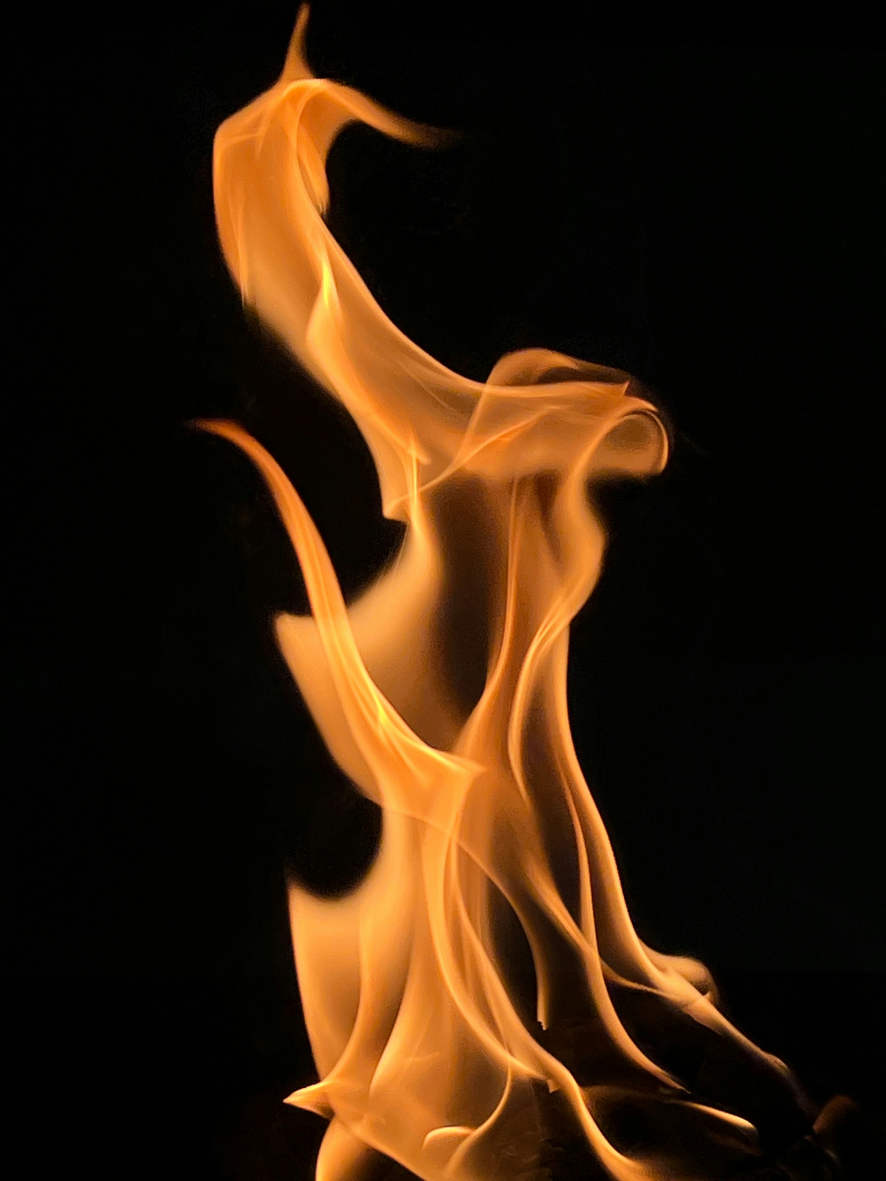 Heat waves and flame visual on dark abstract background