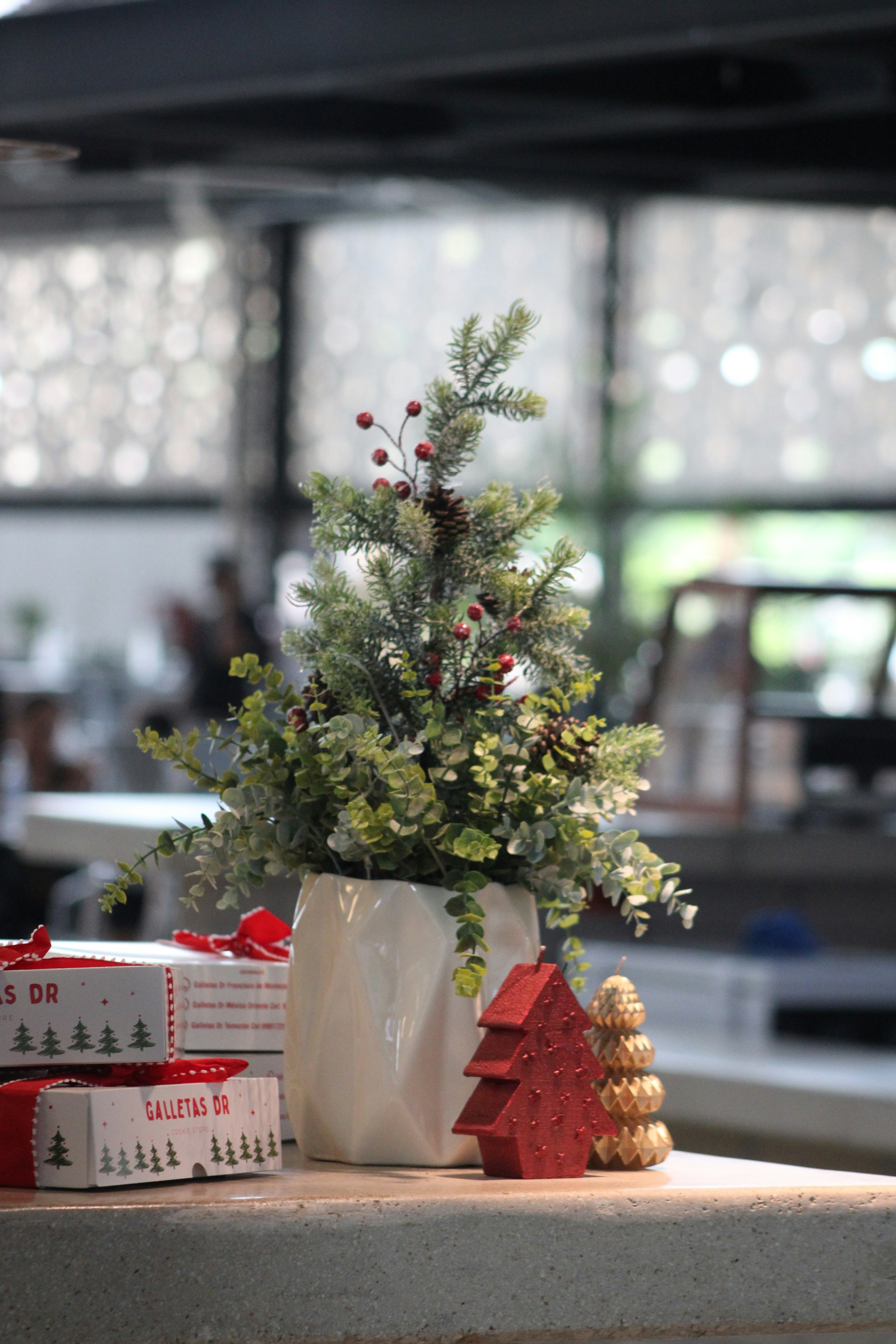 A small christmas tree sitting on top of a counter