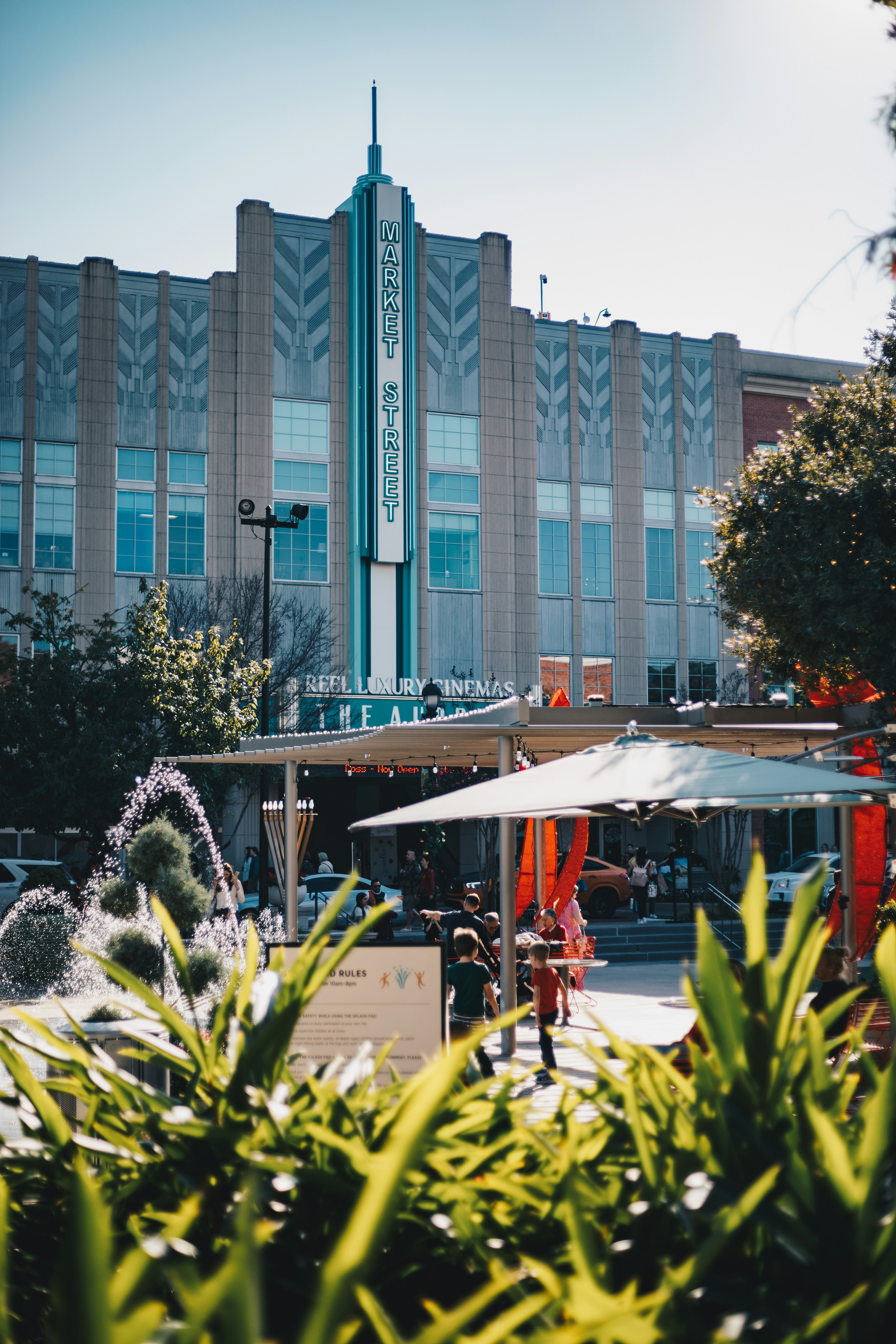 A building with a fountain in front of it