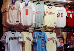 A display of baseball jerseys in a store