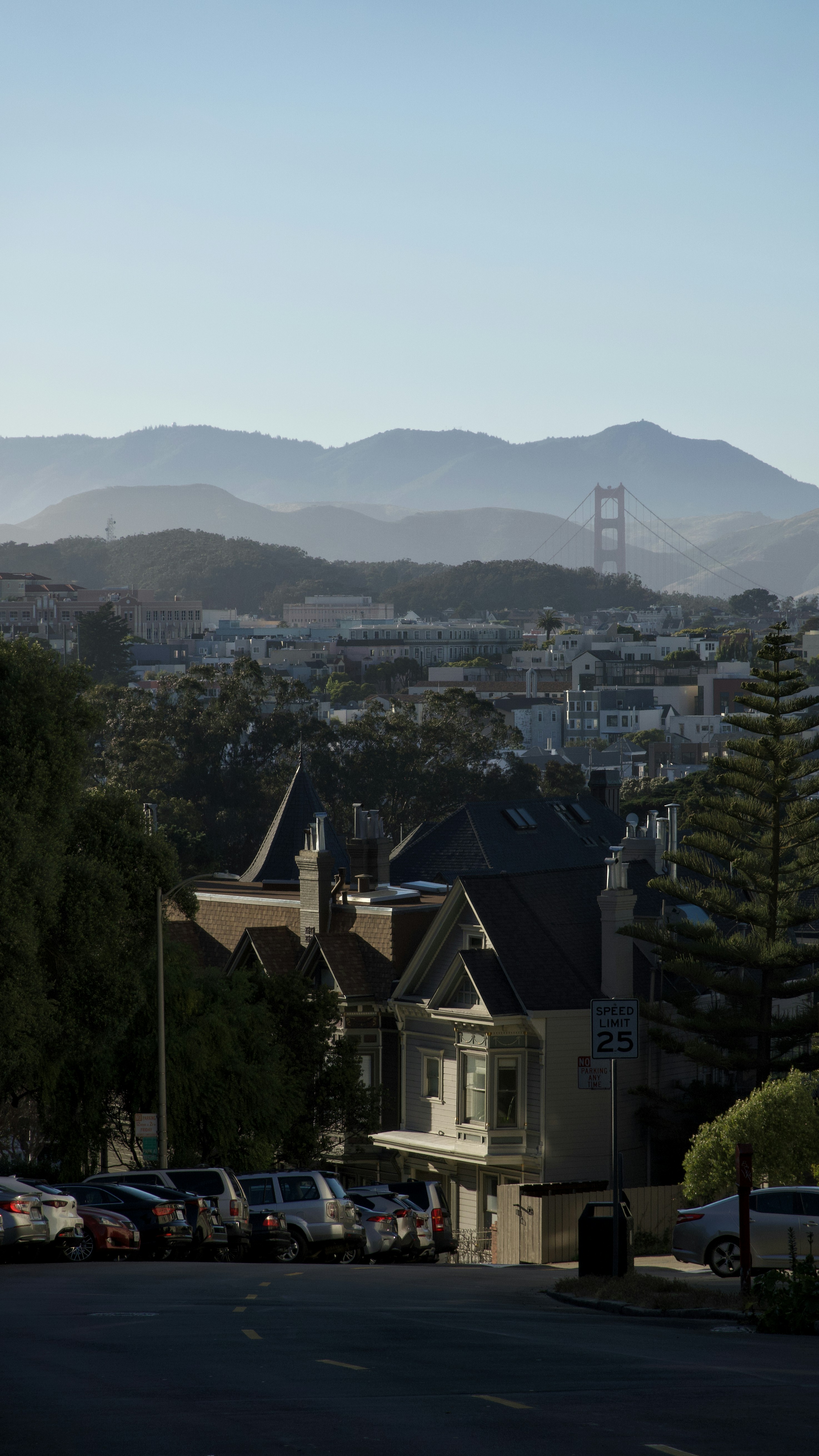 A view of a city with mountains in the background