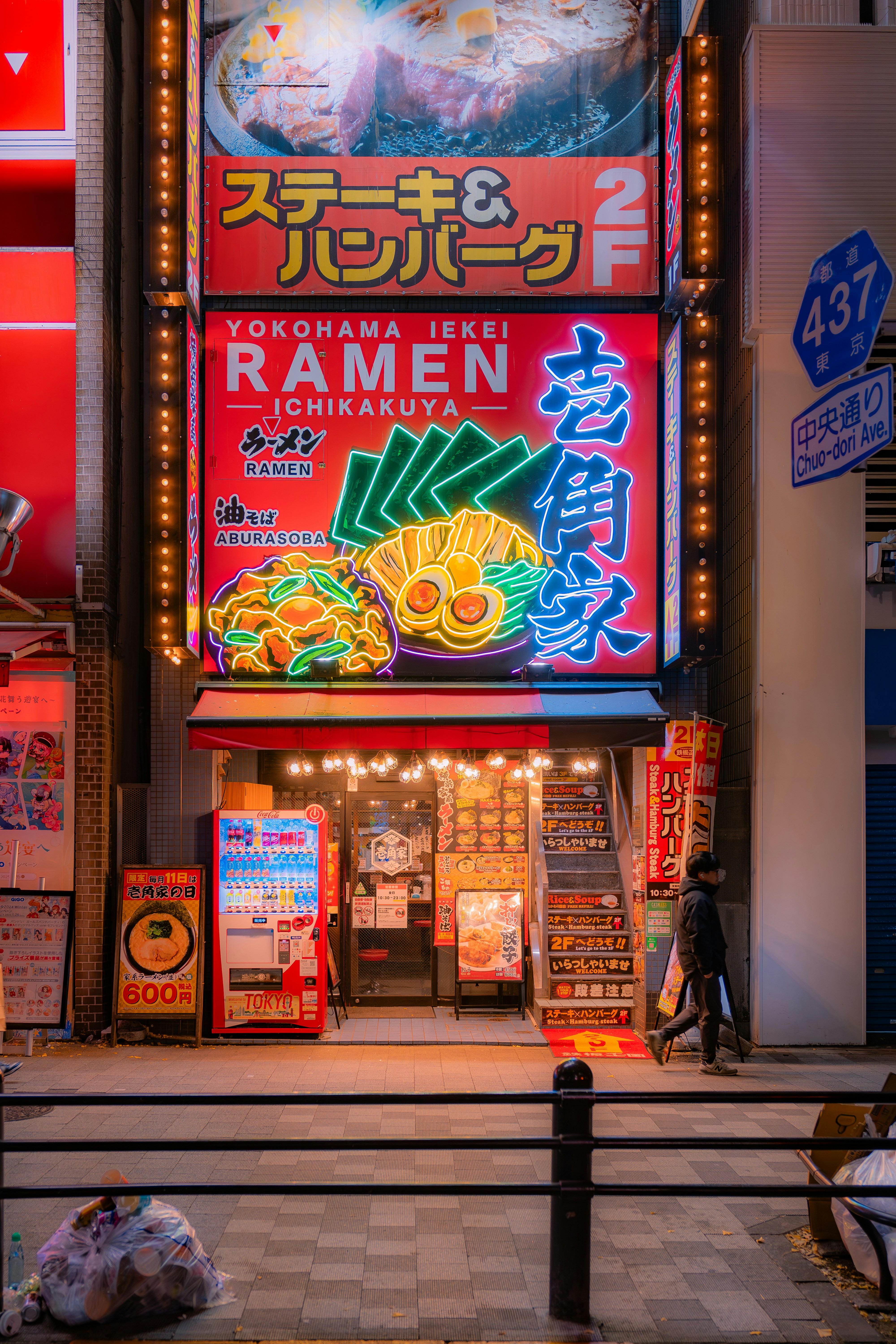 Group enjoying ramen in Japanese alley