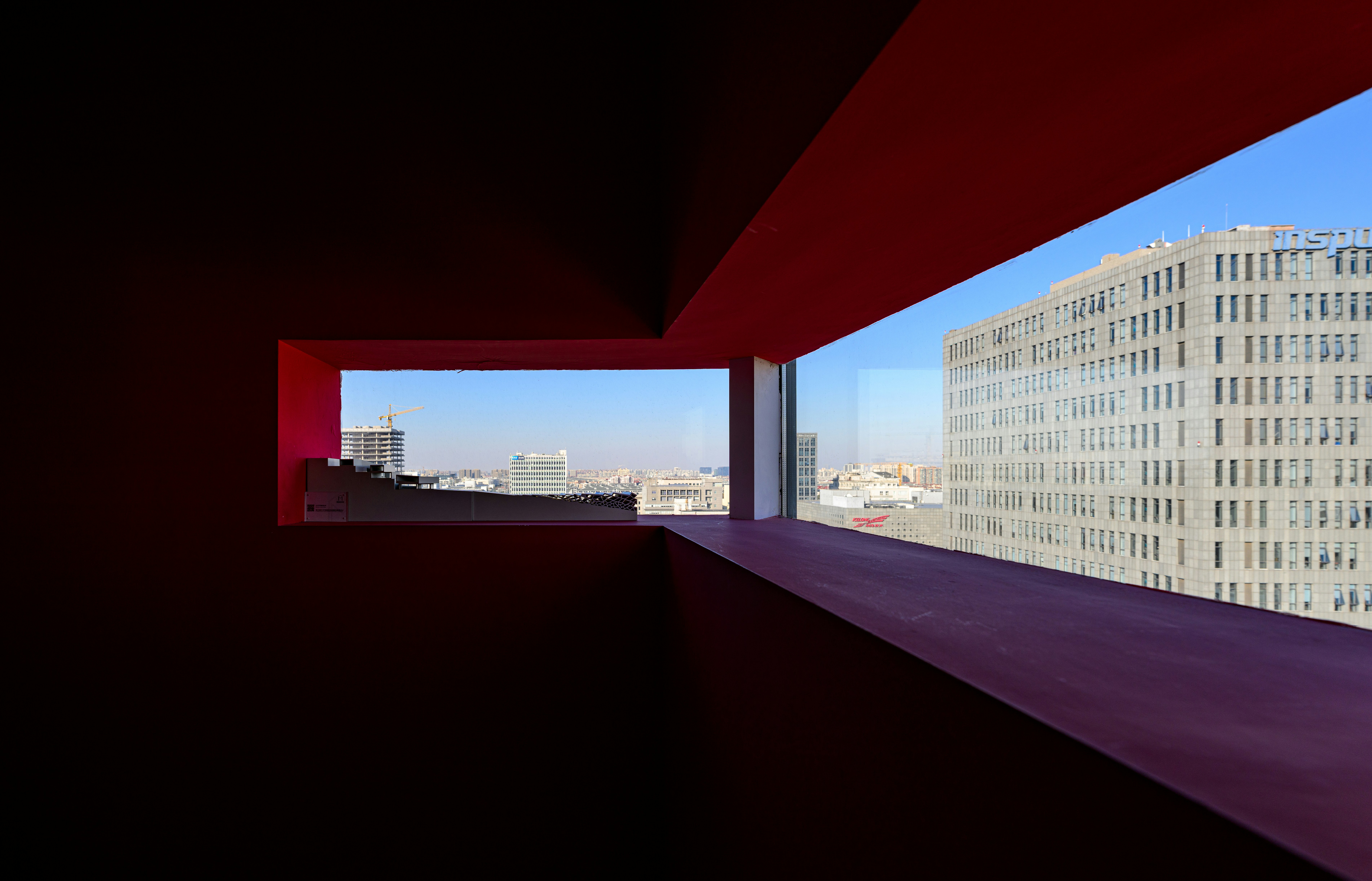 A room with a view of a city