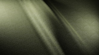 A black and white photo of a curtain