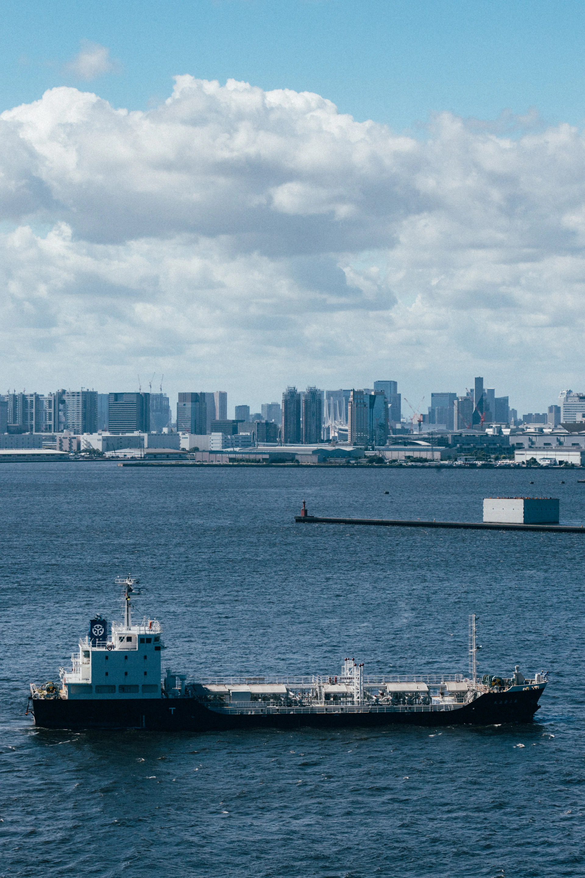 A large boat floating on top of a large body of water