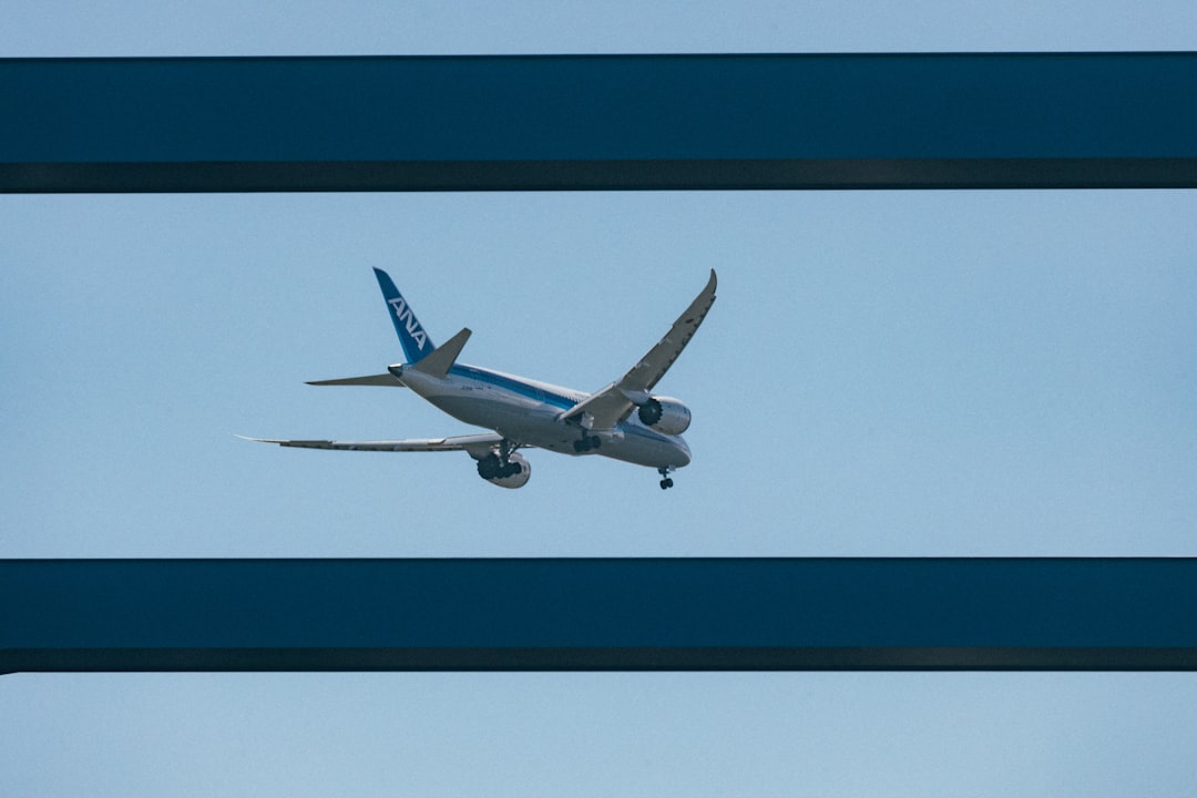 Airplane in blue sky