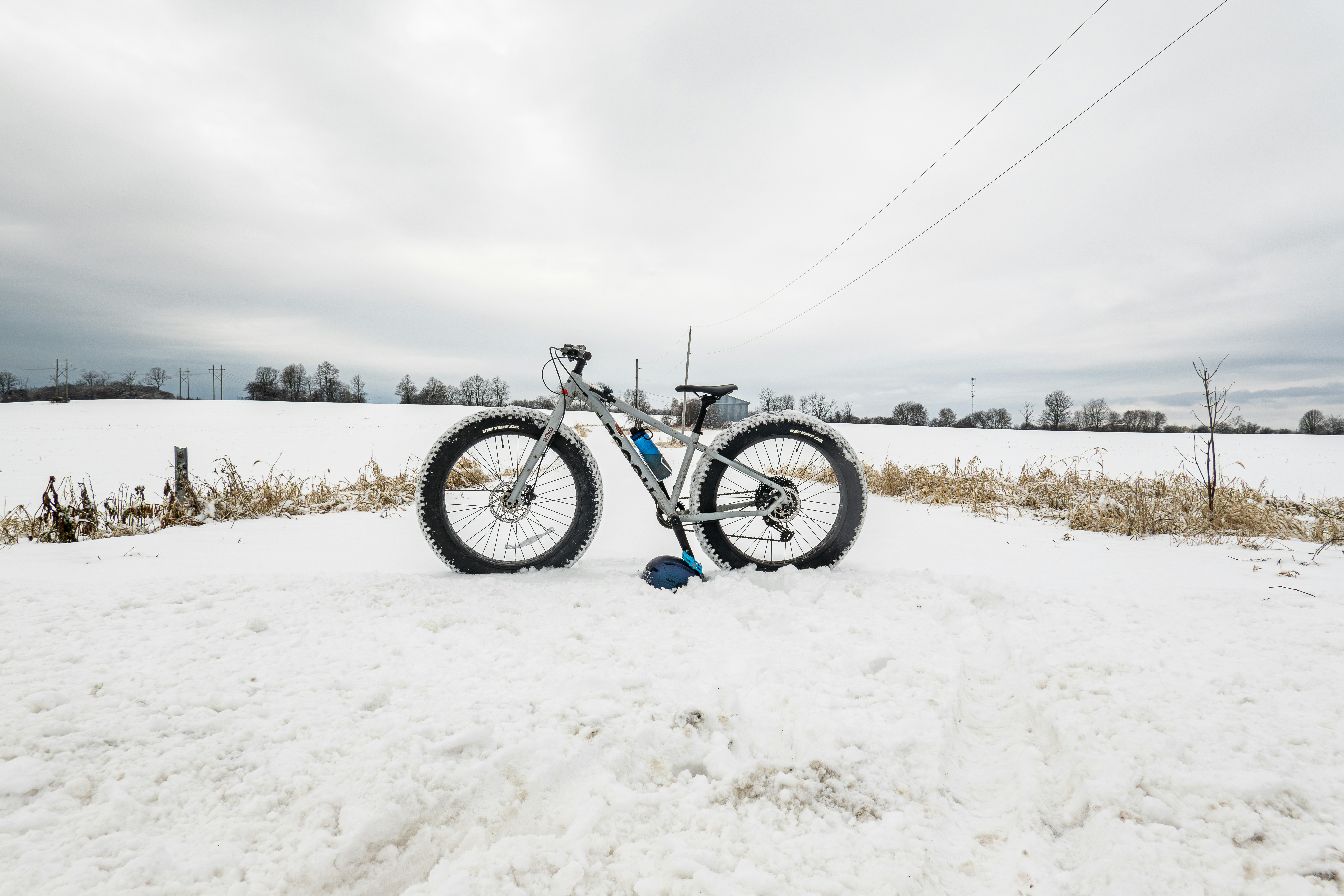 A bike that is sitting in the snow