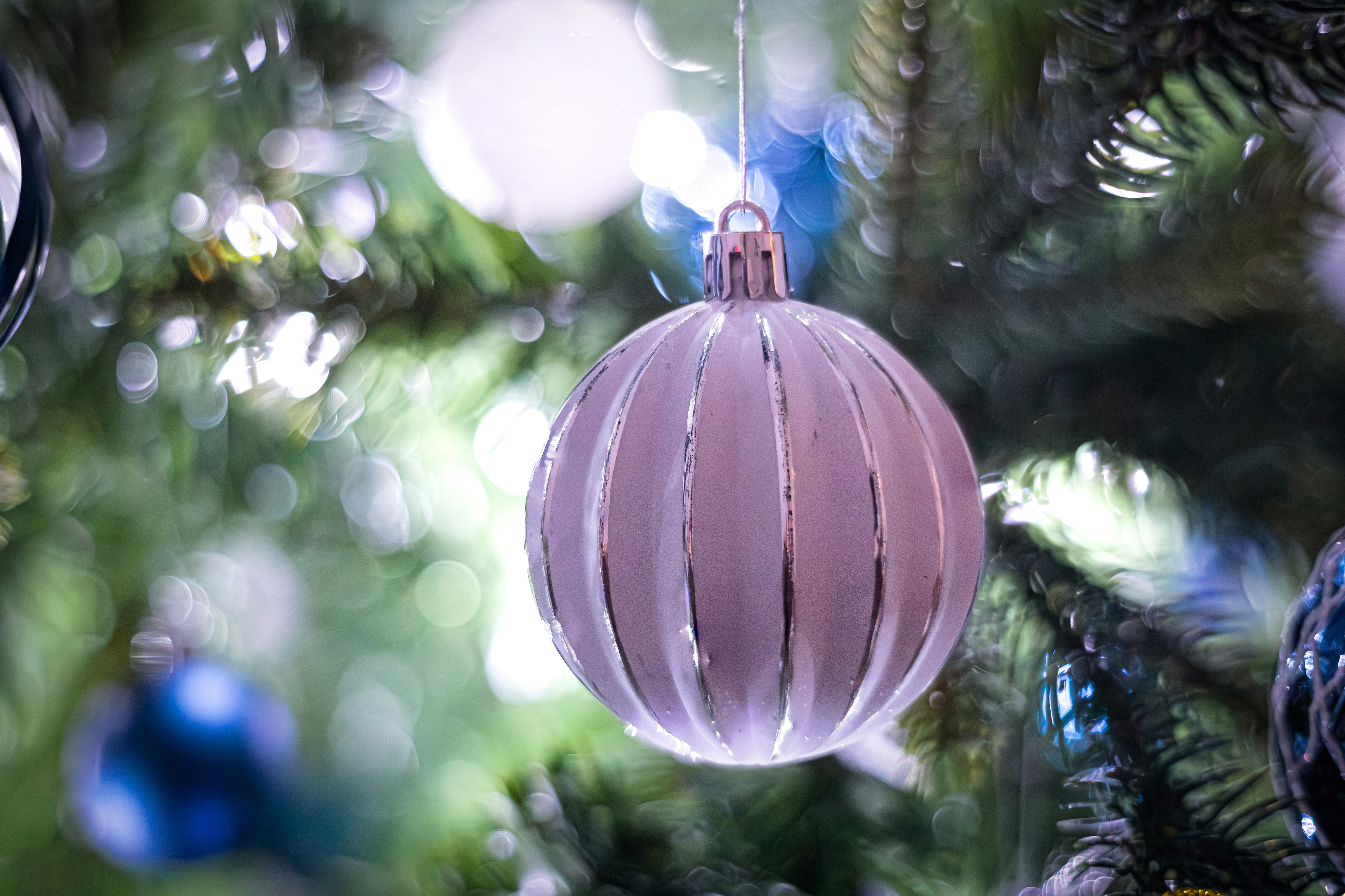 A close up of a christmas tree with ornaments