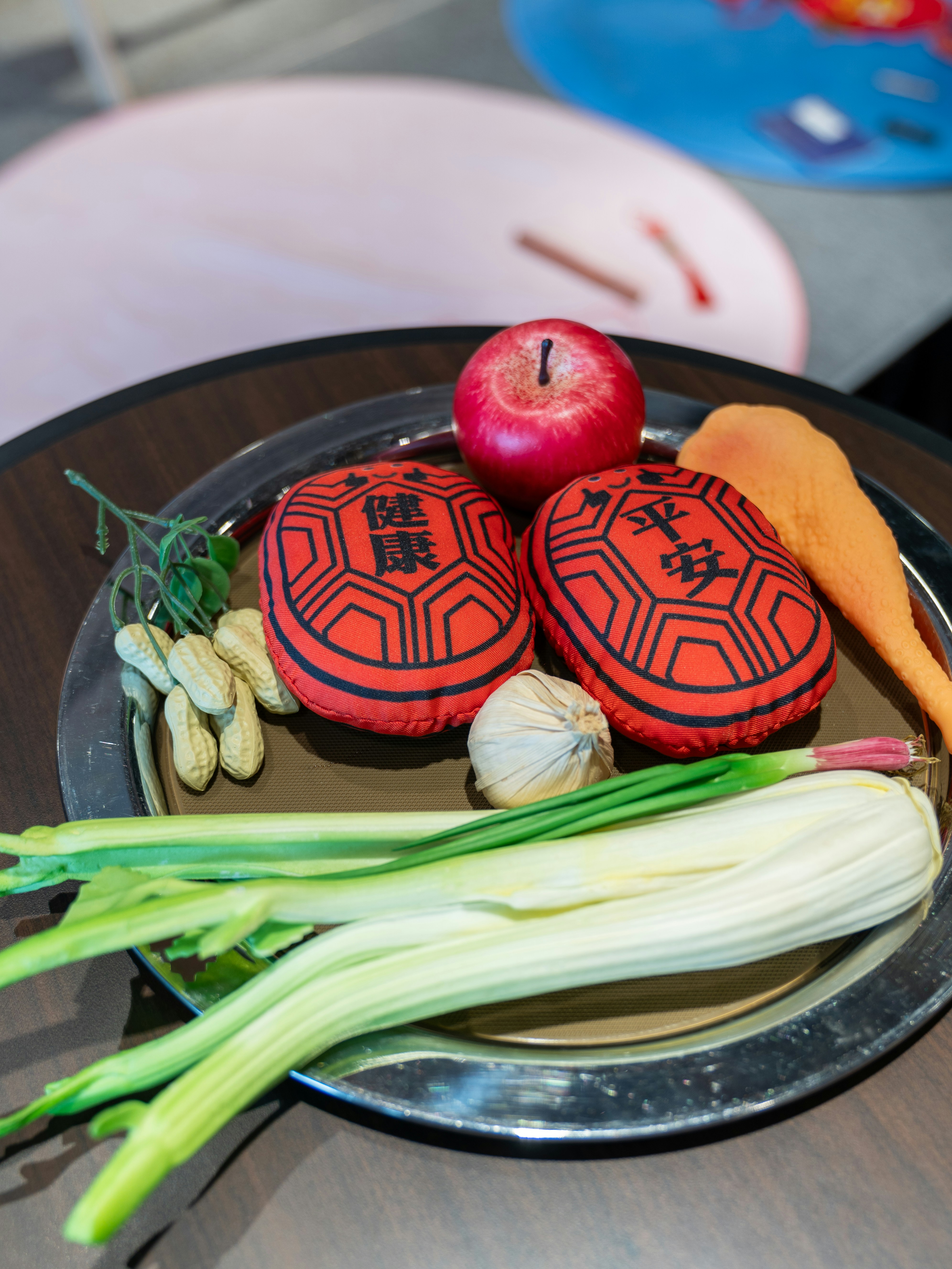 A plate of food on a table with an apple
