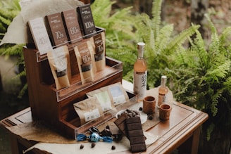 A wooden table topped with lots of different items