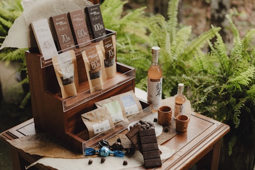 A wooden table topped with lots of different items