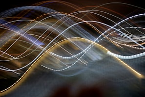 A blurry photo of a wave of light