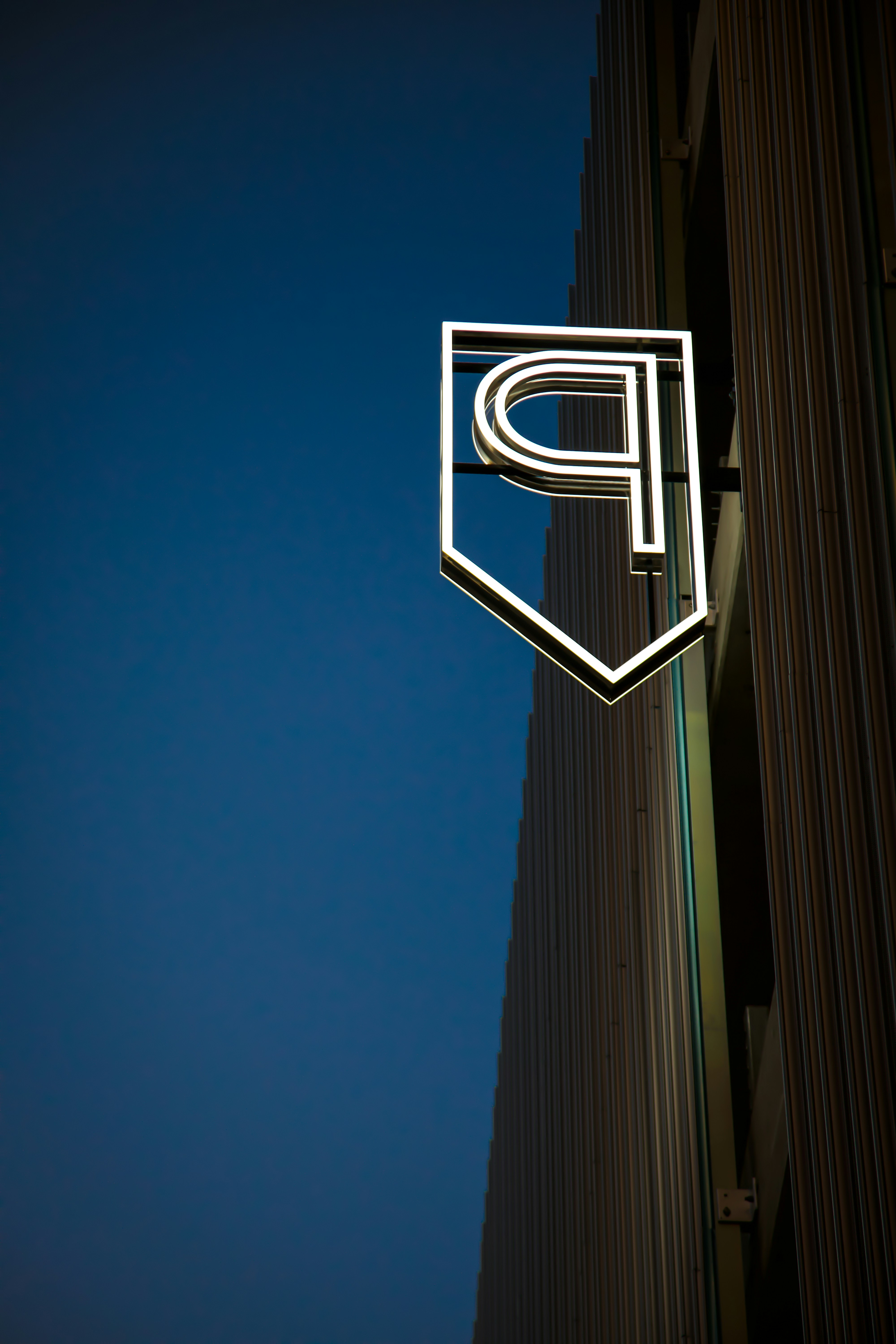 A sign that is on the side of a building