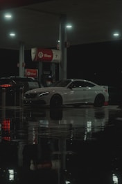 A car is parked at a gas station