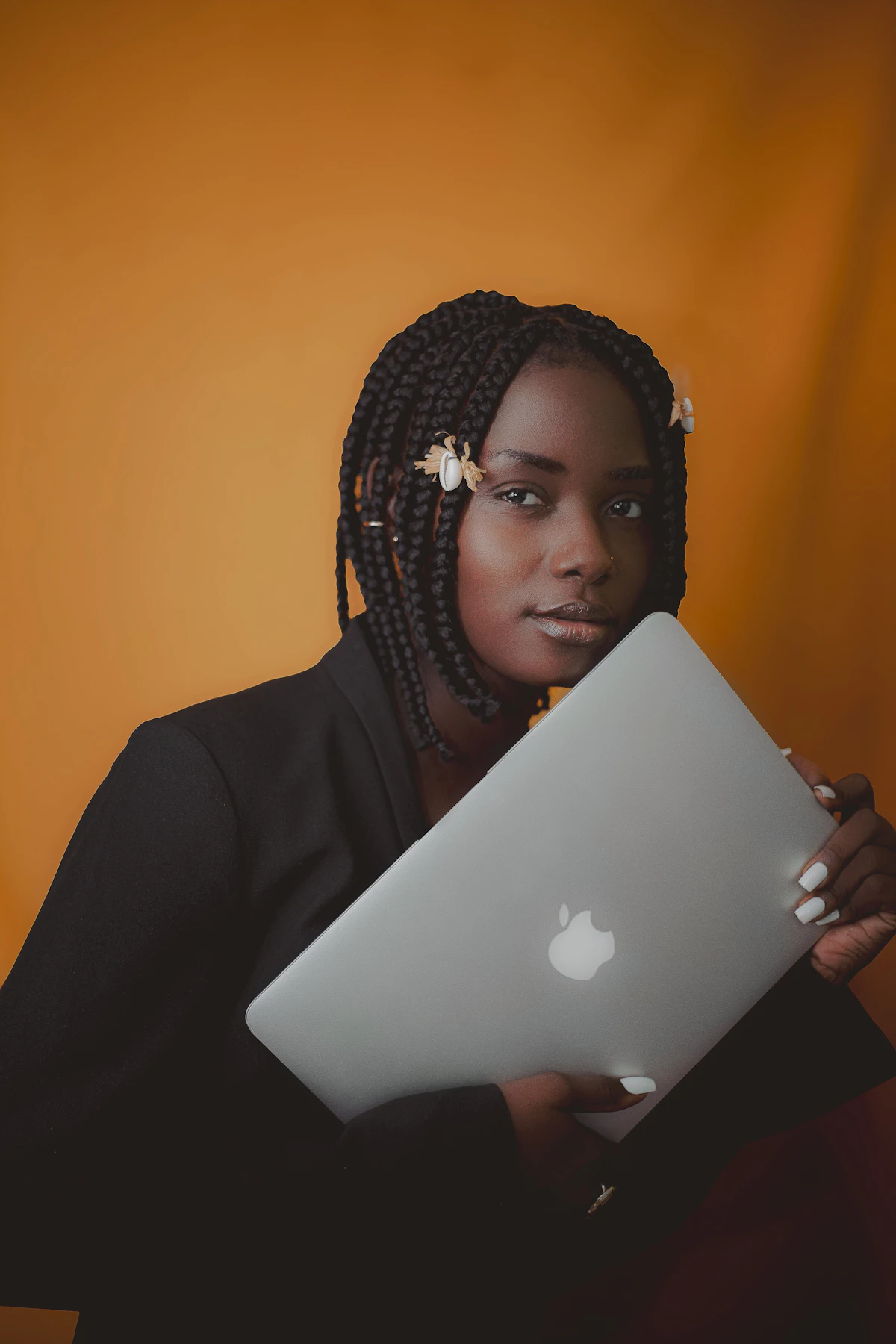 Black tech professional monitoring emerging AI trends in East Africa