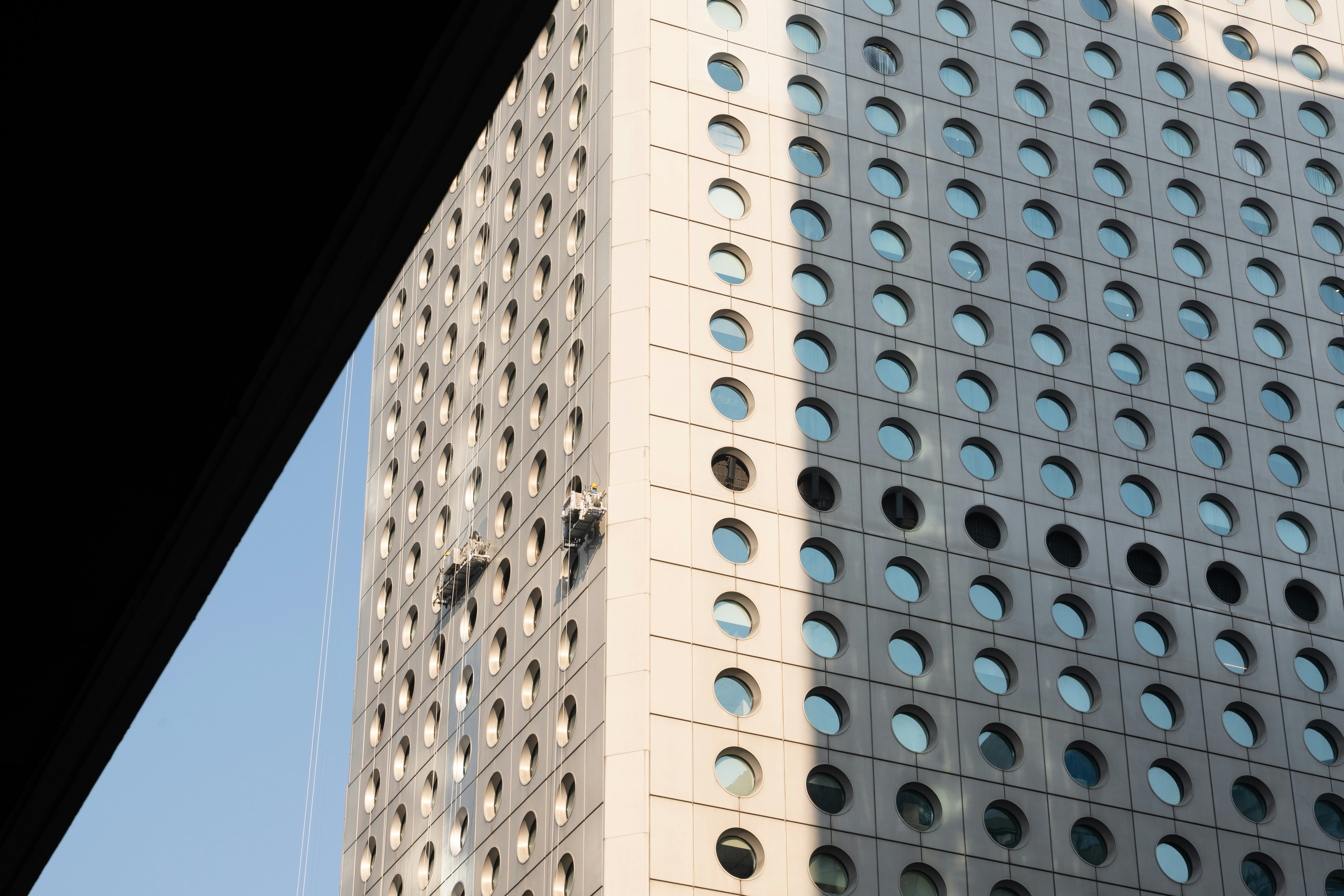 A tall building with a clock on the side of it