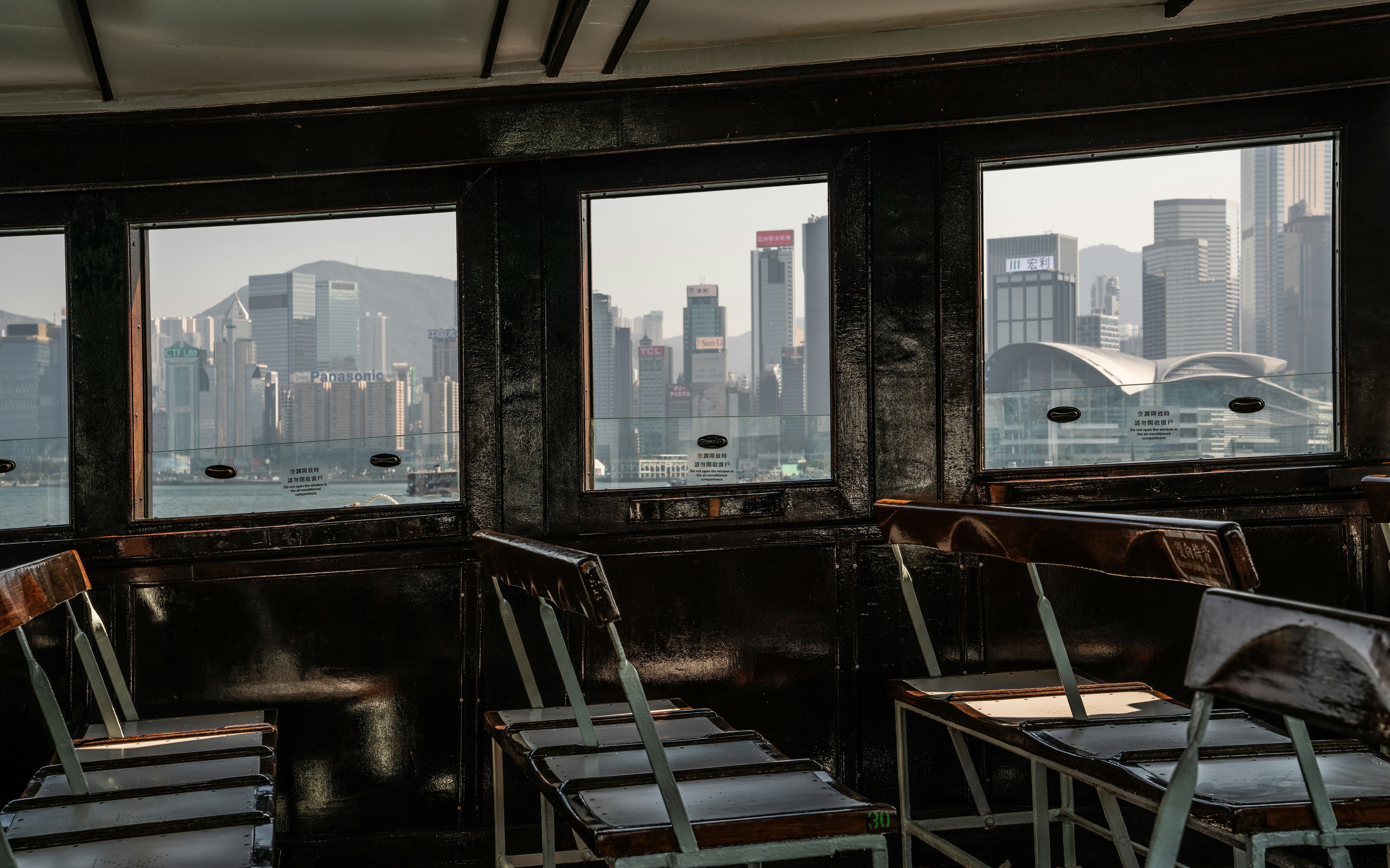 A room filled with lots of chairs and windows
