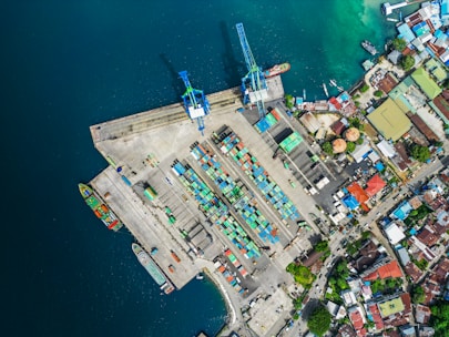 An aerial view of a city next to a body of water