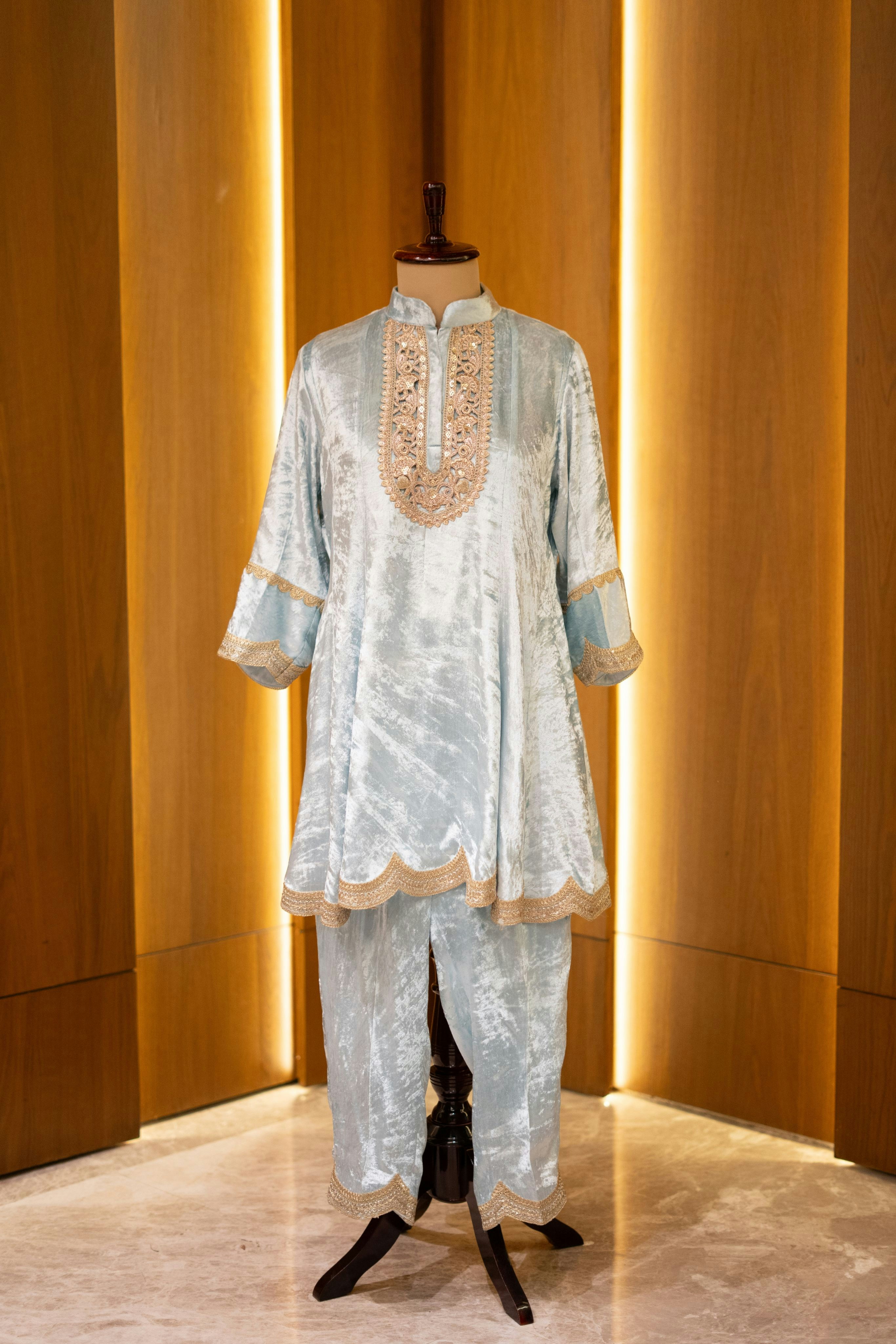 Regal floor-length salwar suit with intricate embroidery