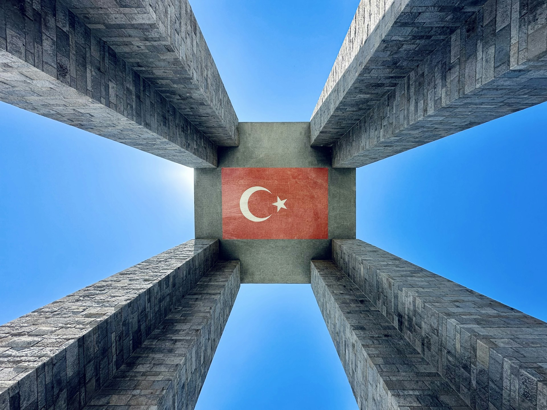 A picture of a turkey flag in the middle of a building