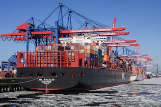 A large cargo ship docked at a dock