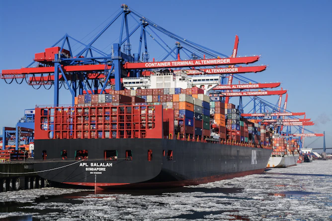 A large cargo ship docked at a dock
