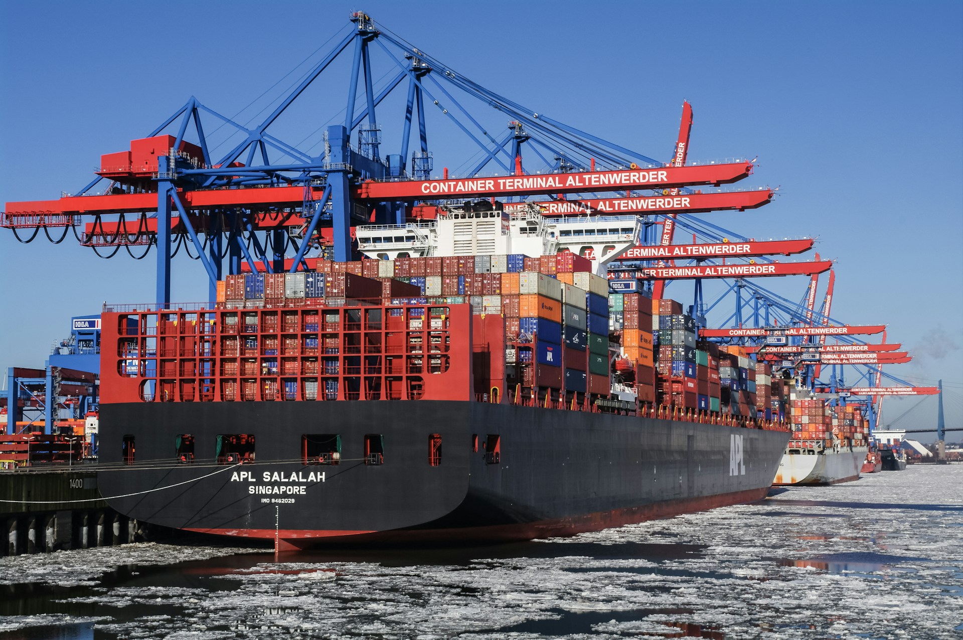 A large cargo ship docked at a dock