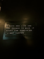 A sign on a wall that says i have one life and one chance to make