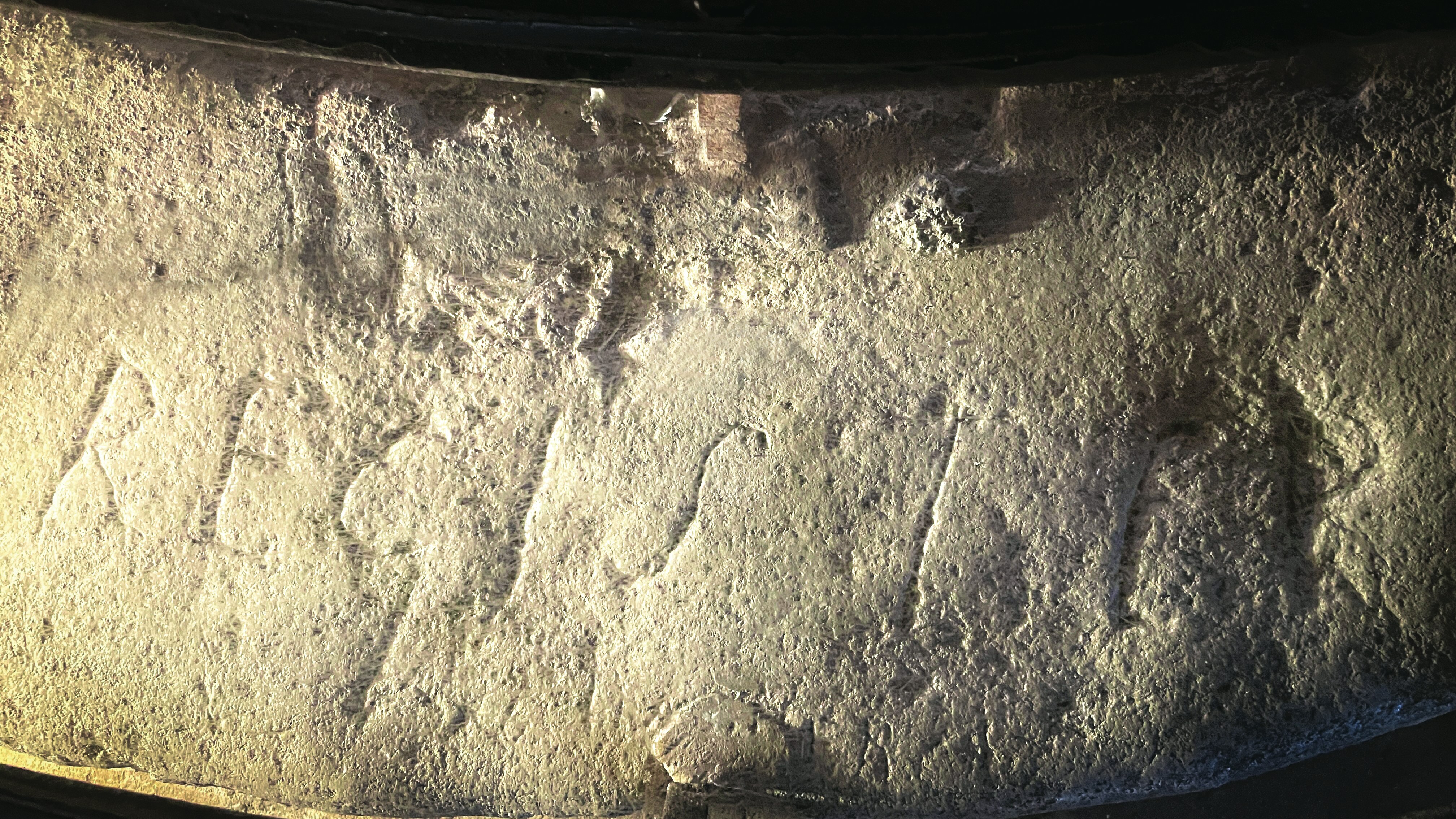 A close up view of a stone wall