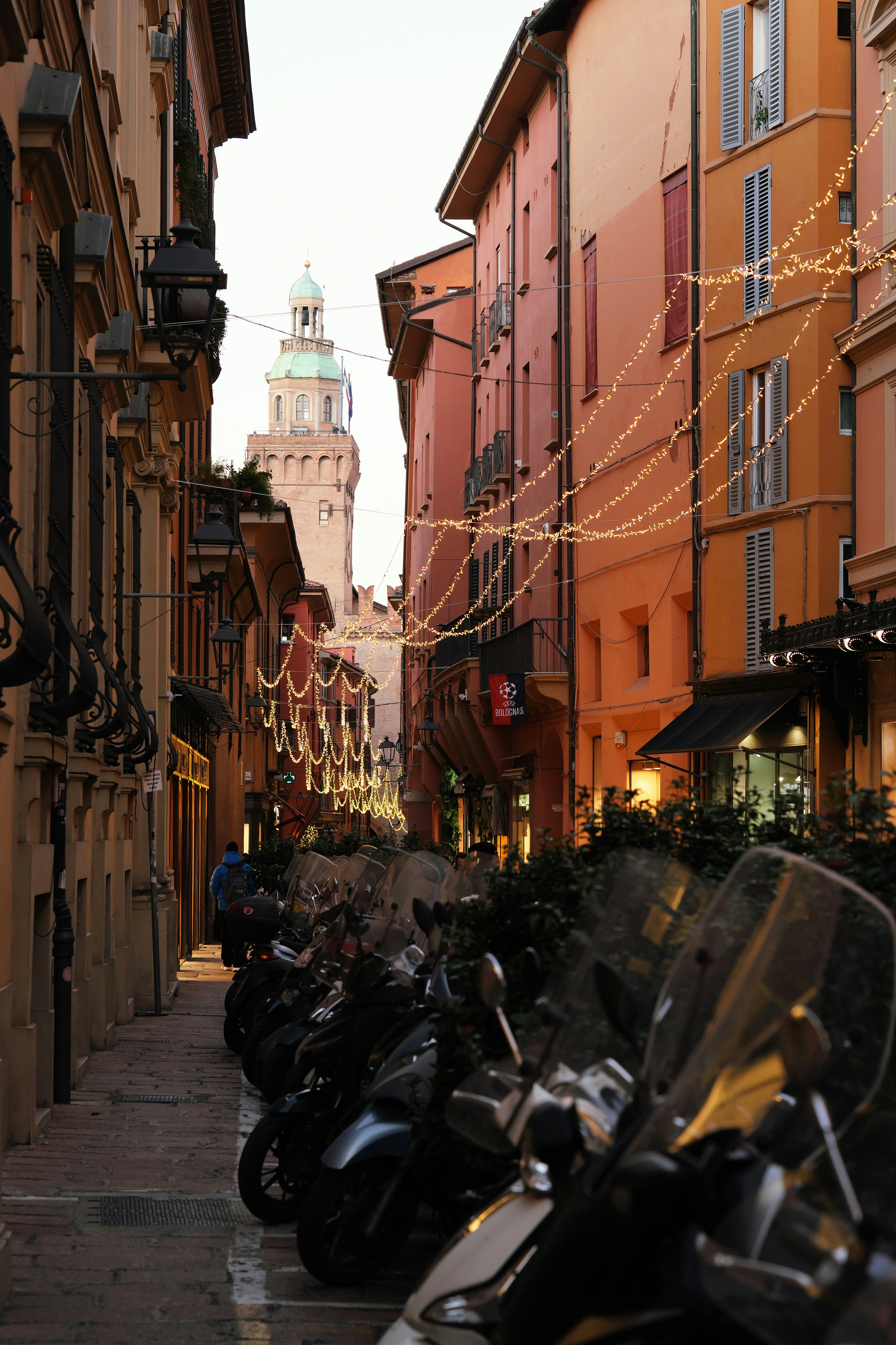 budget Europe backpacking traveler walking through a Western European city