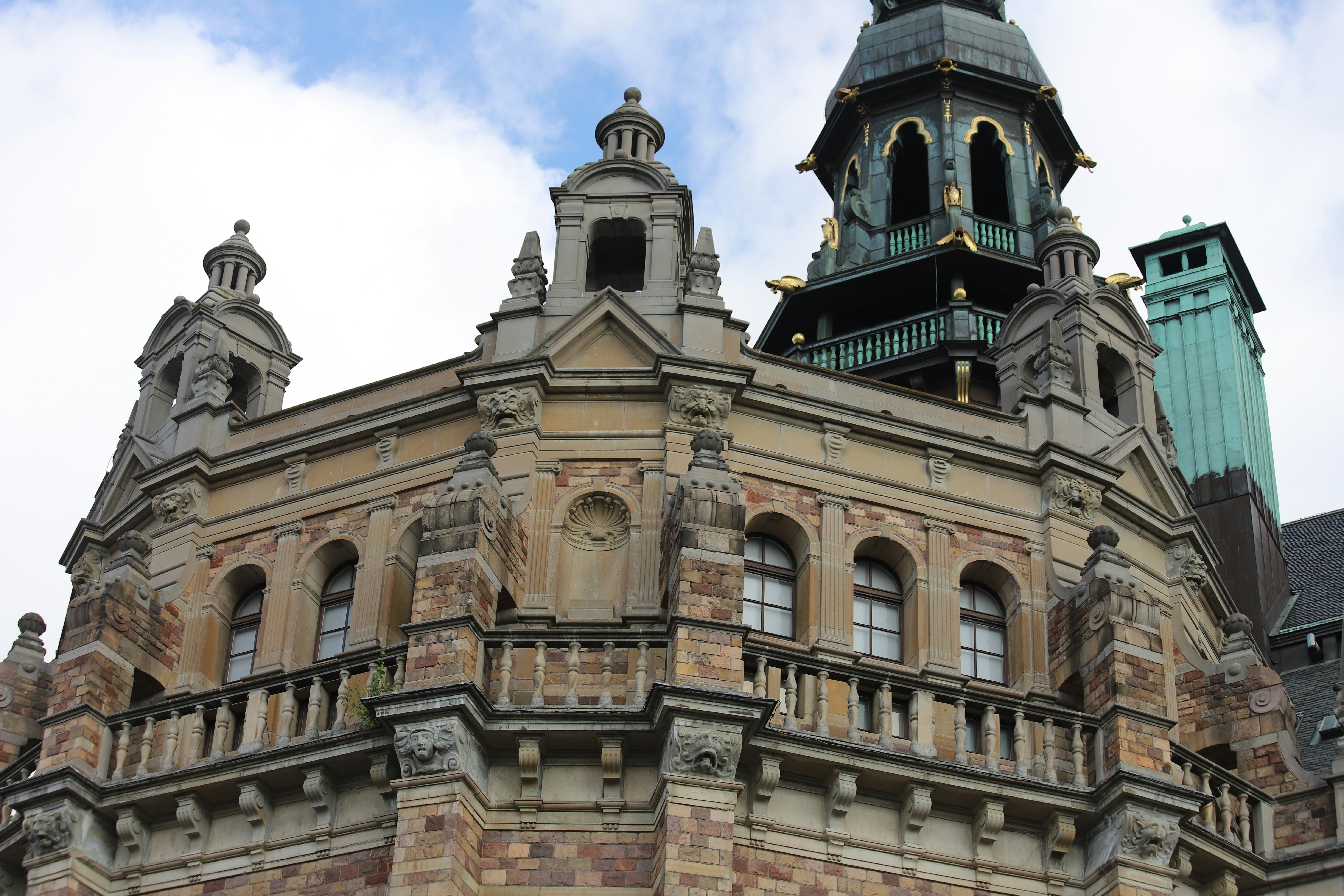 A large building with a clock on the top of it