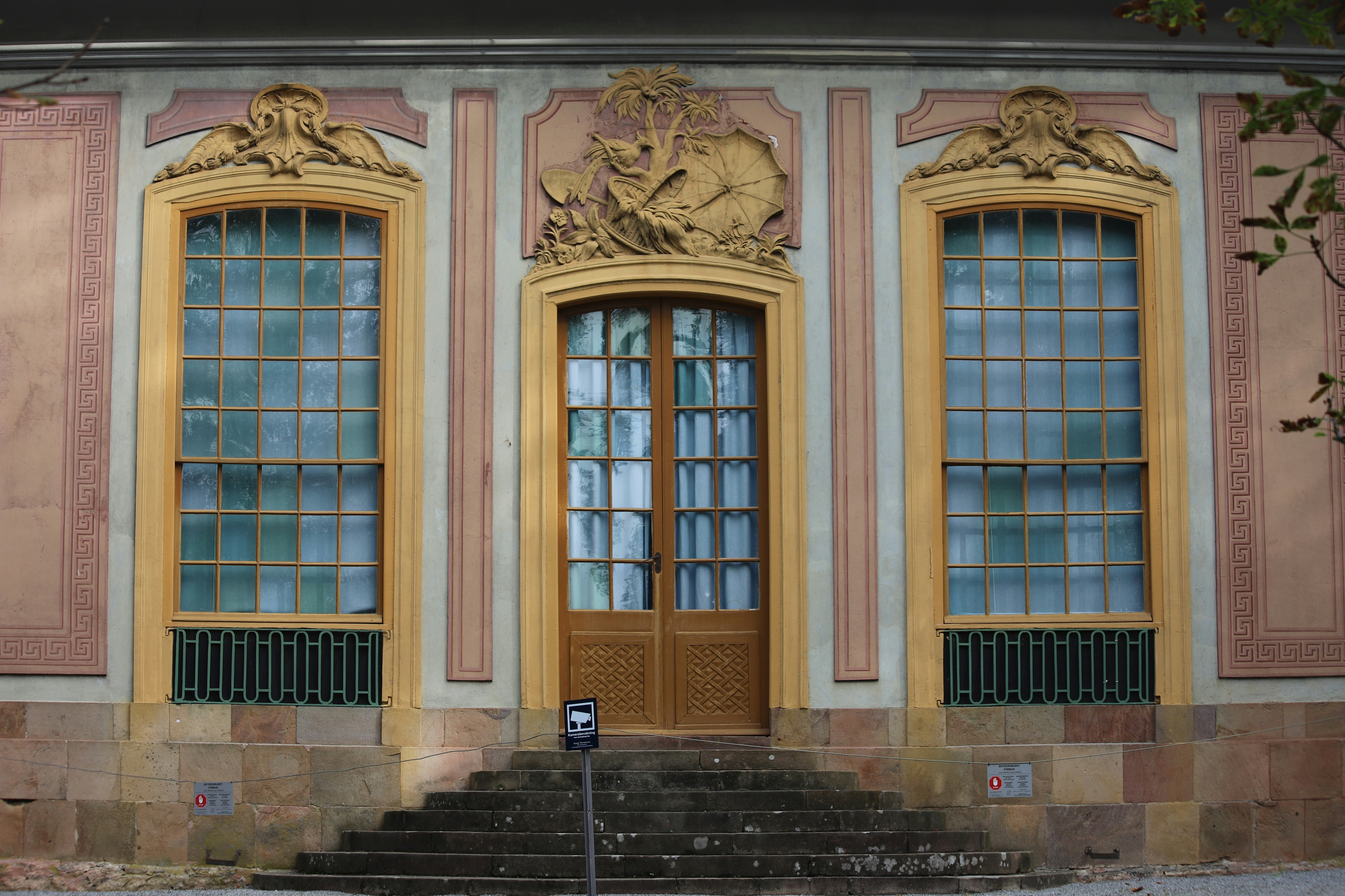 A large building with a lot of windows and doors
