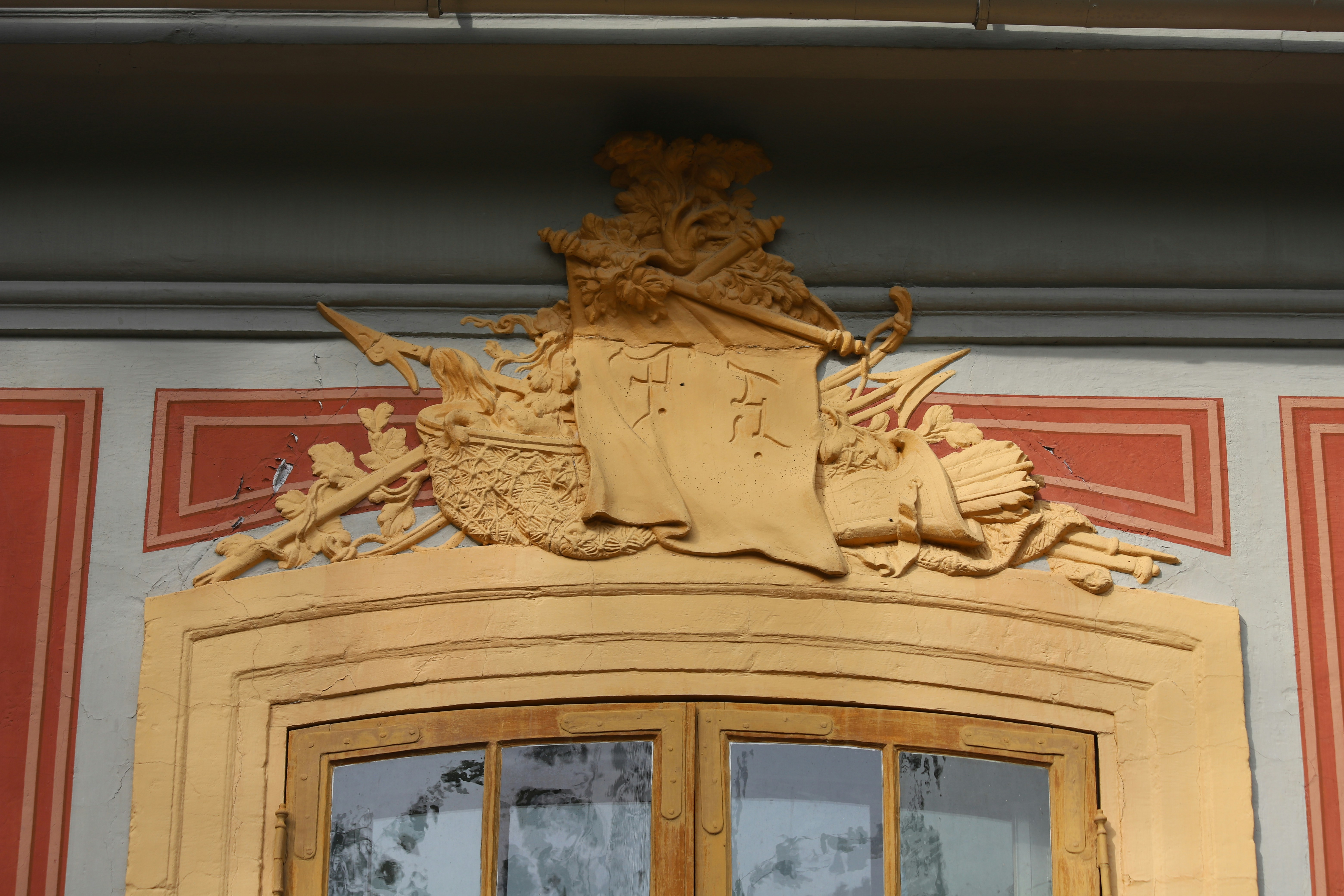 A close up of a wooden door with carvings on it