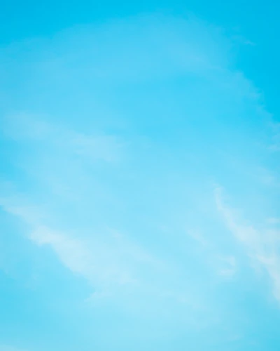 A blue sky with some clouds in it