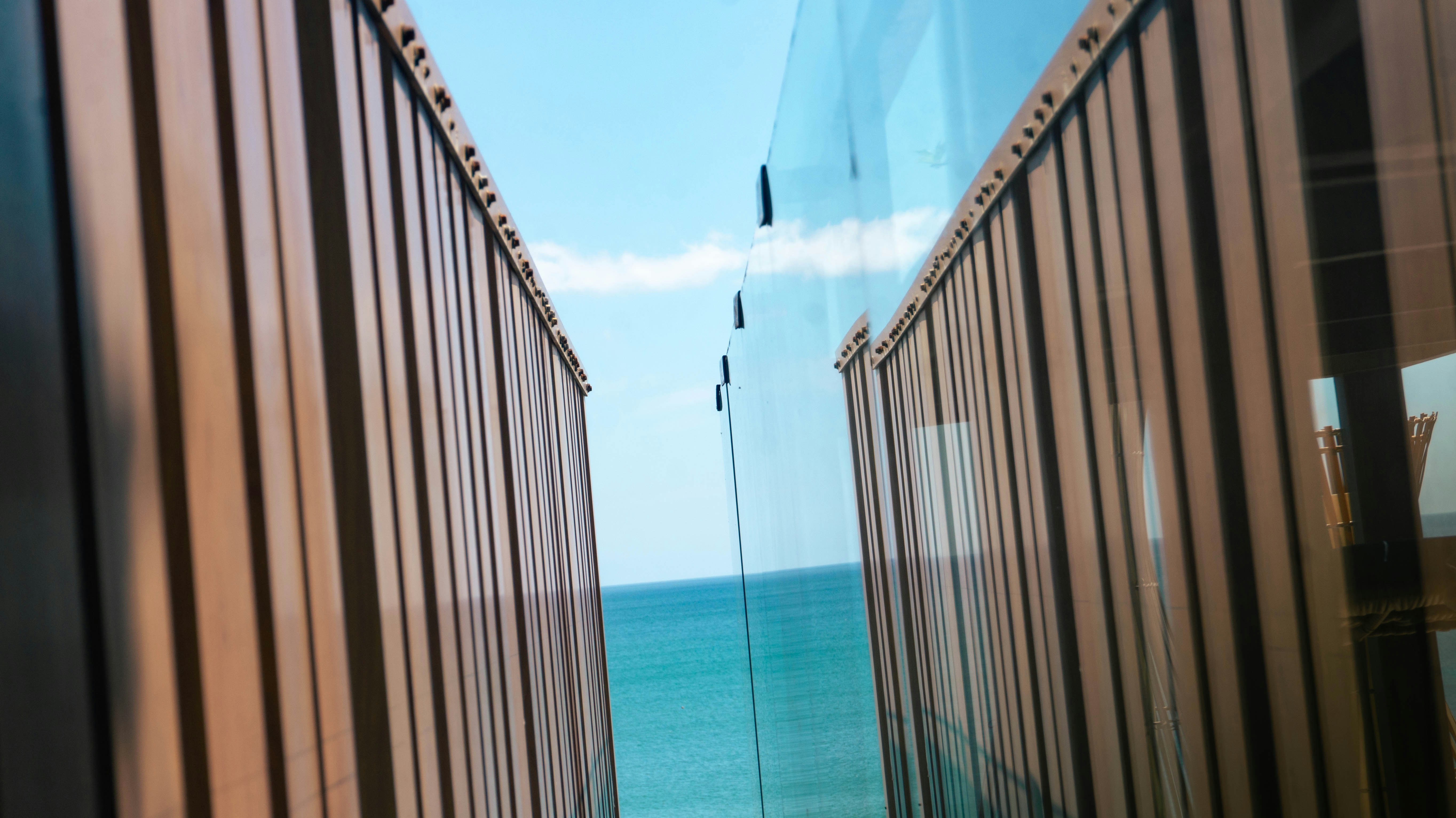 A view of the ocean from a train window