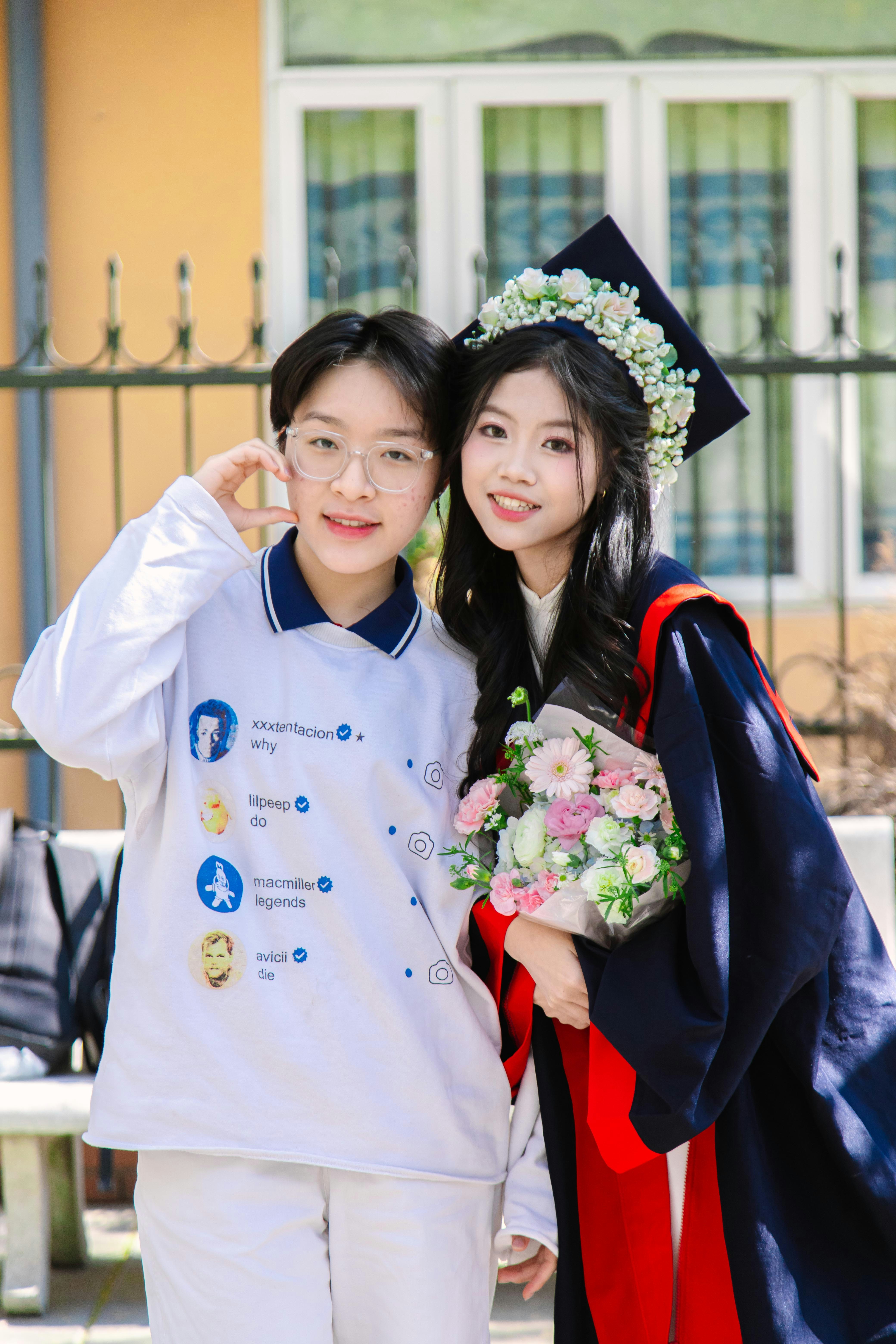 A couple of women standing next to each other