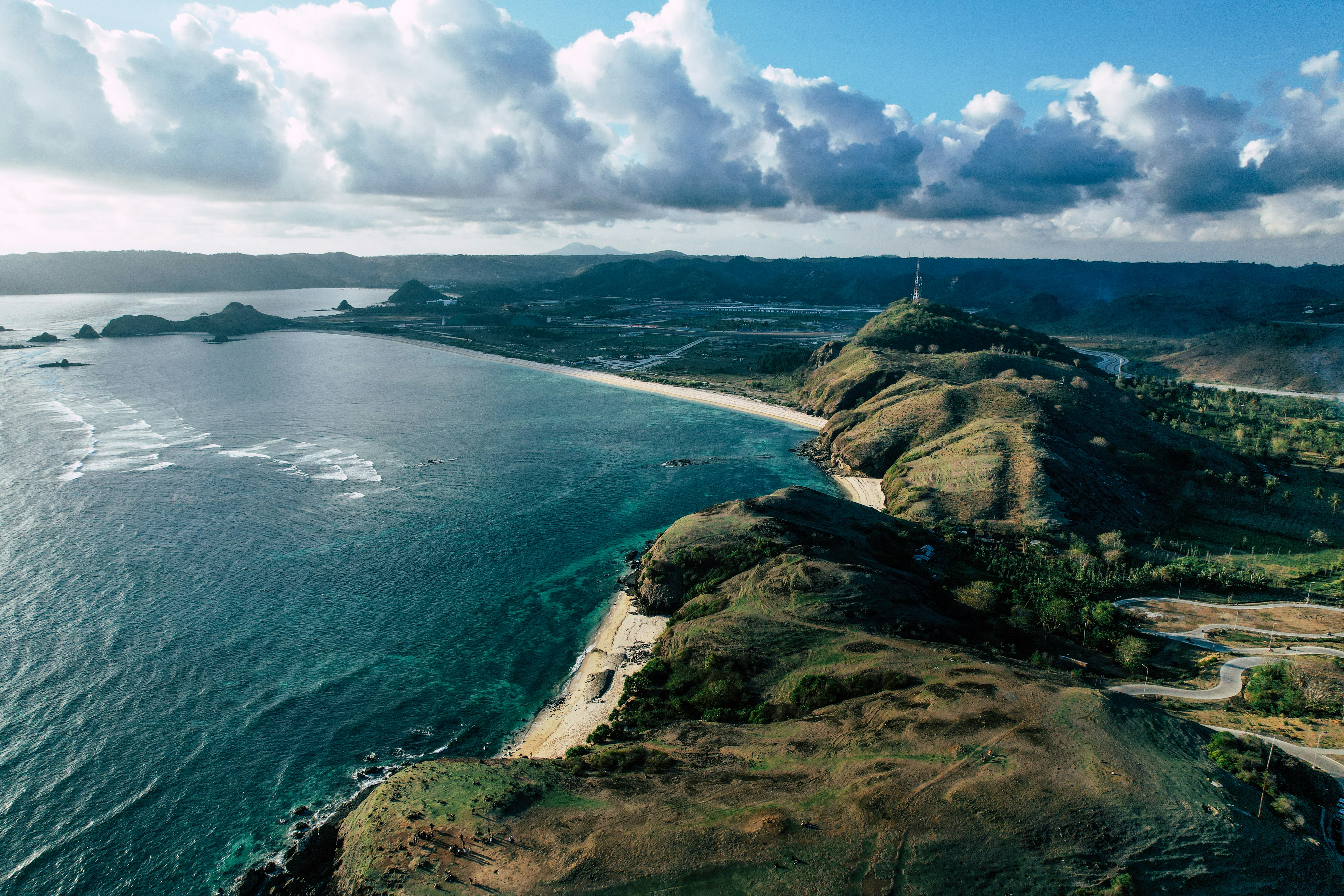 An aerial view of an island in the middle of the ocean