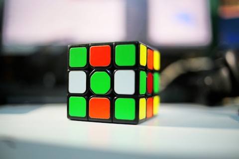 A rubik cube sitting on top of a table