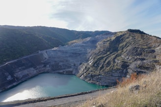 A large body of water surrounded by mountains