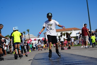 A man riding a skateboard down a street