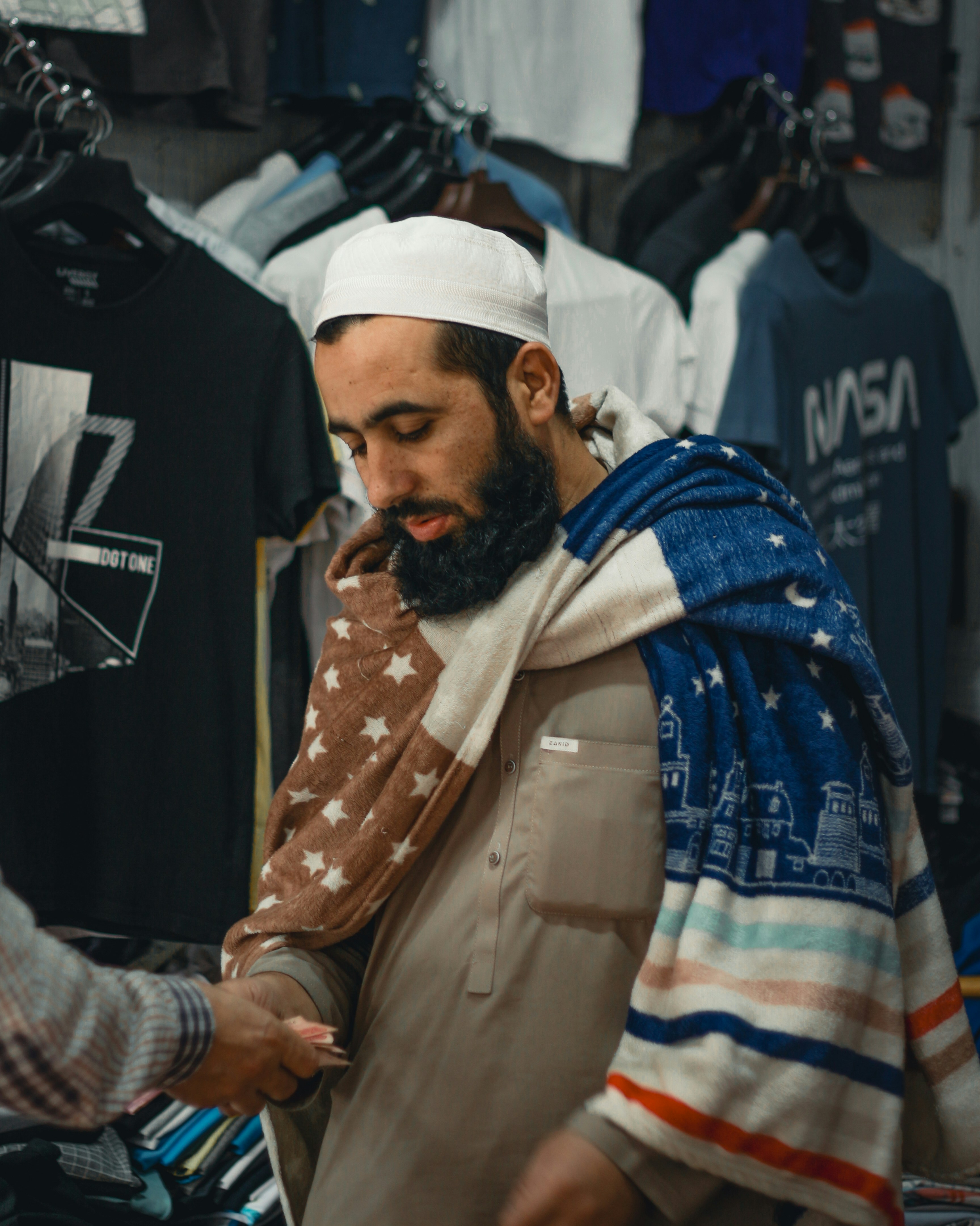 A man with a white turban and a man with a beard