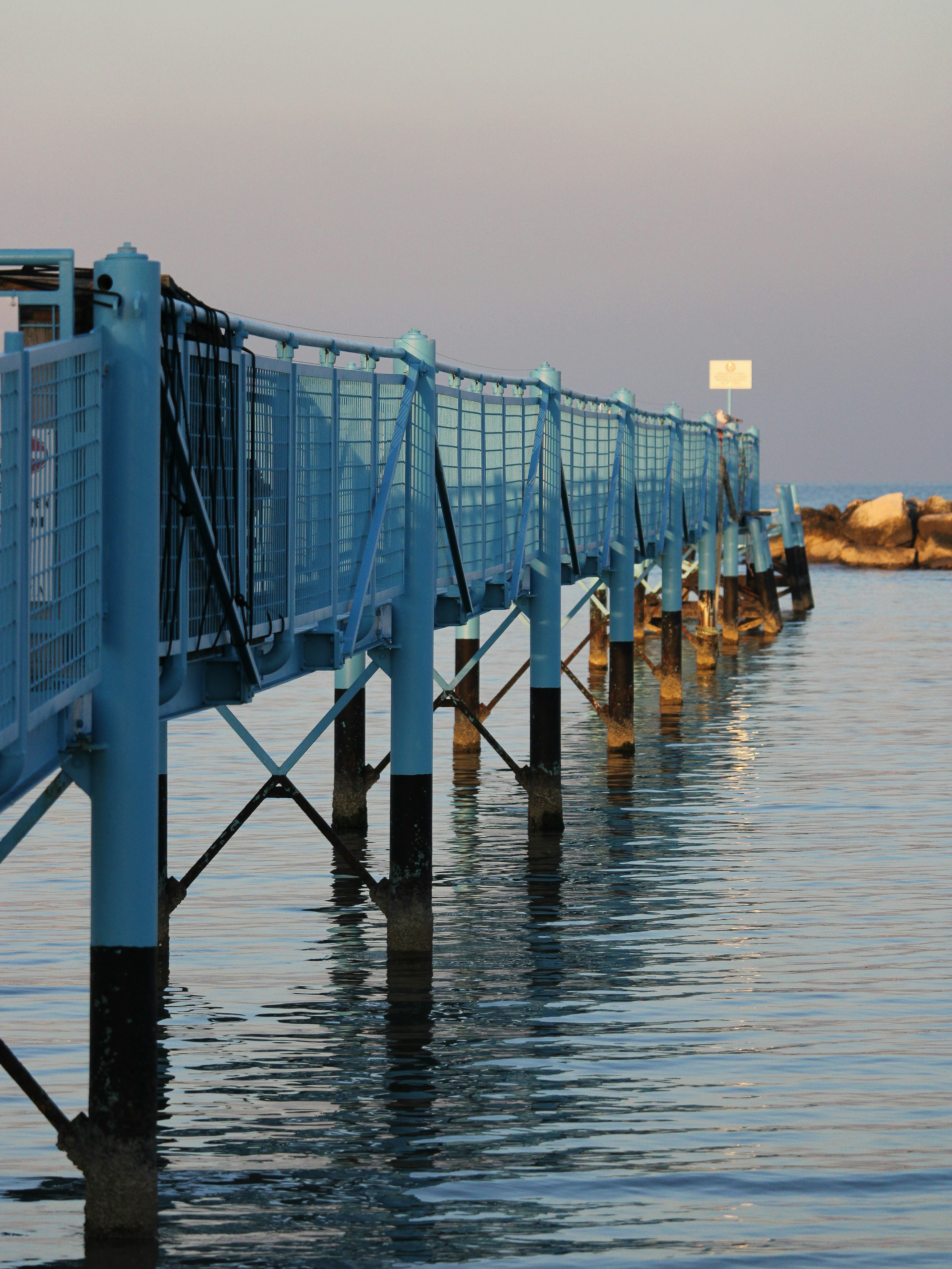 A robust seawall protecting a scenic coastal area