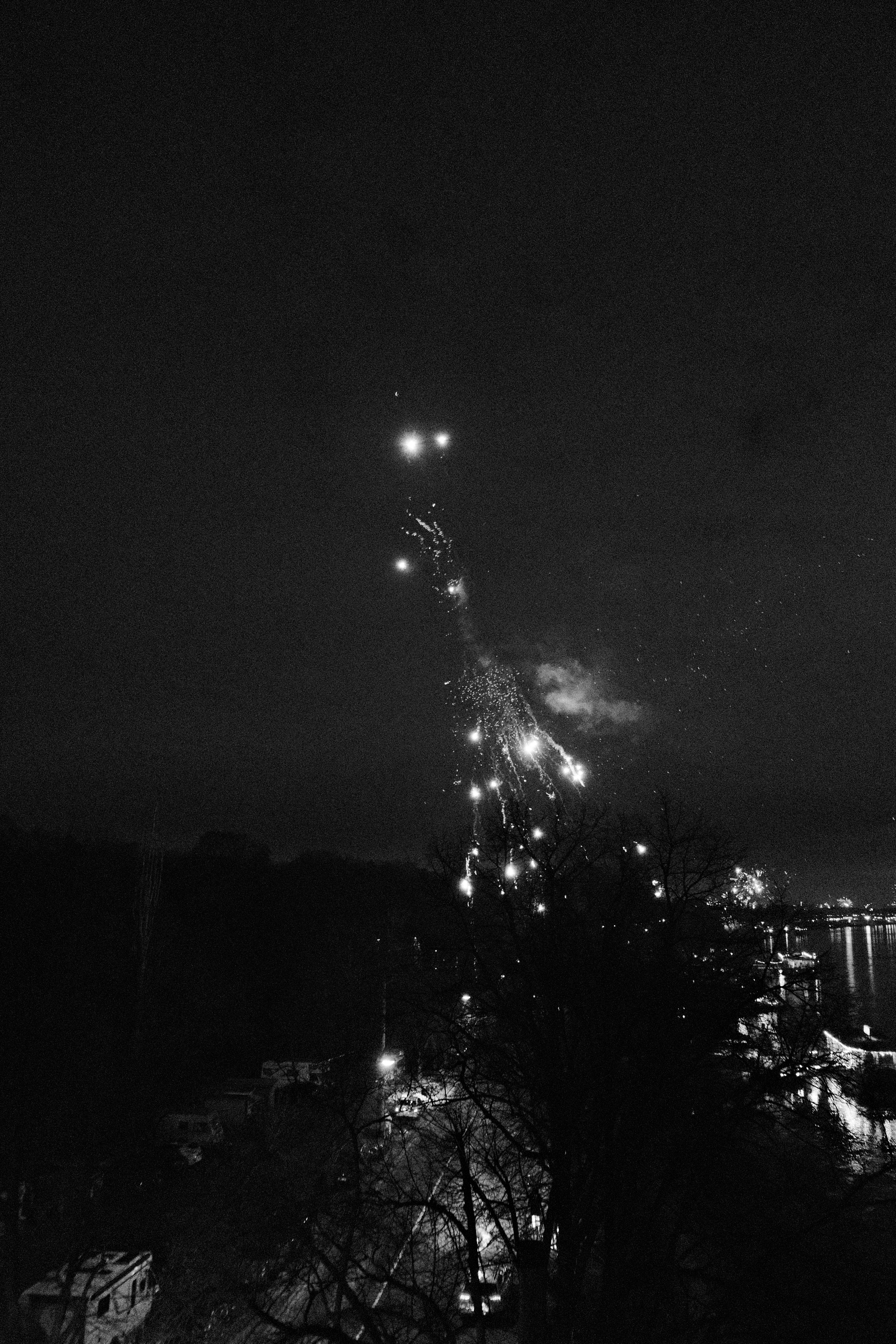 A black and white photo of a city at night