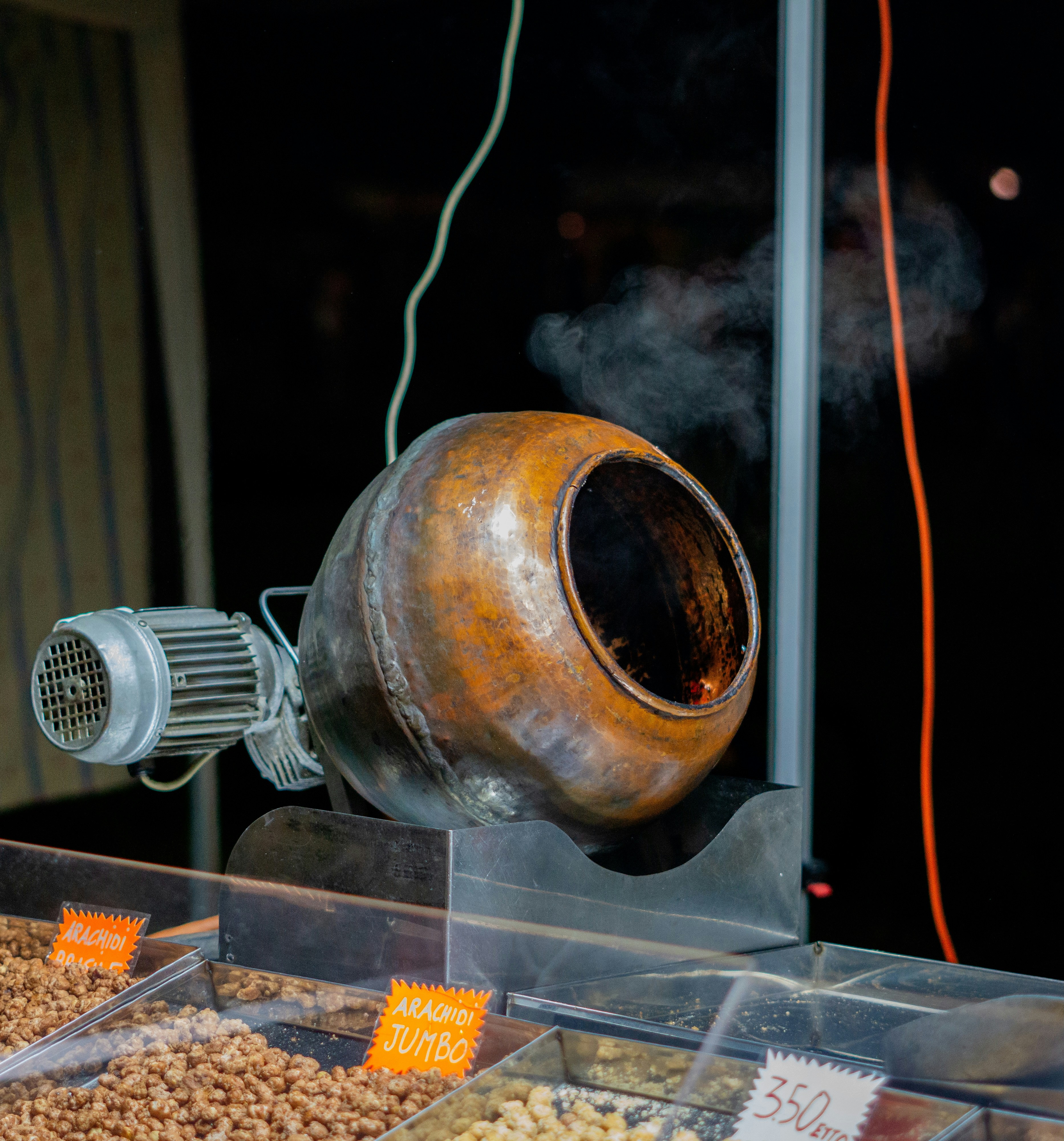 A food stand with nuts and other items on display