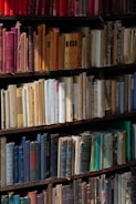 A book shelf filled with lots of books