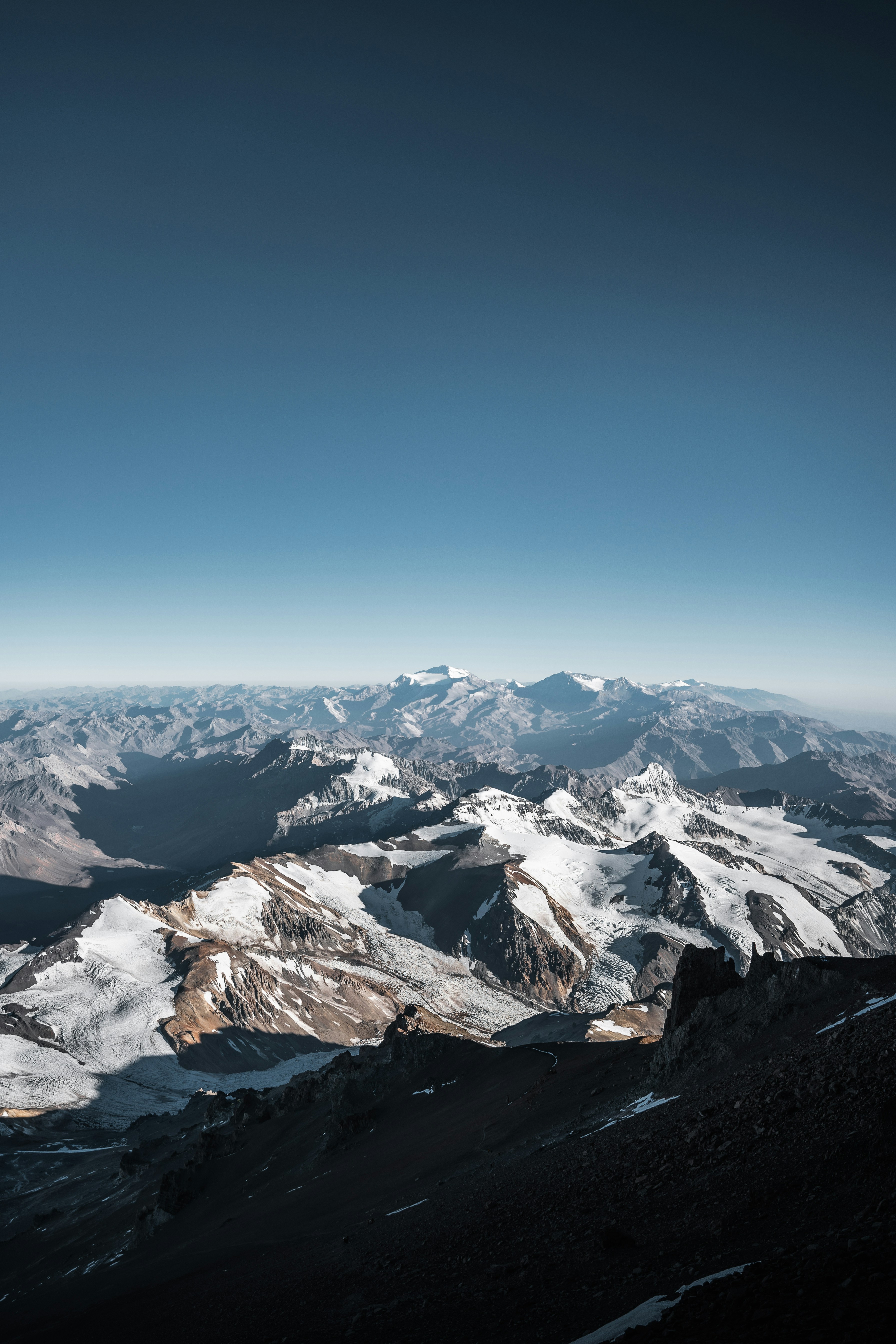A view of a mountain range from a plane photo – Free Mountains Image on  Unsplash, image size:3000x4500