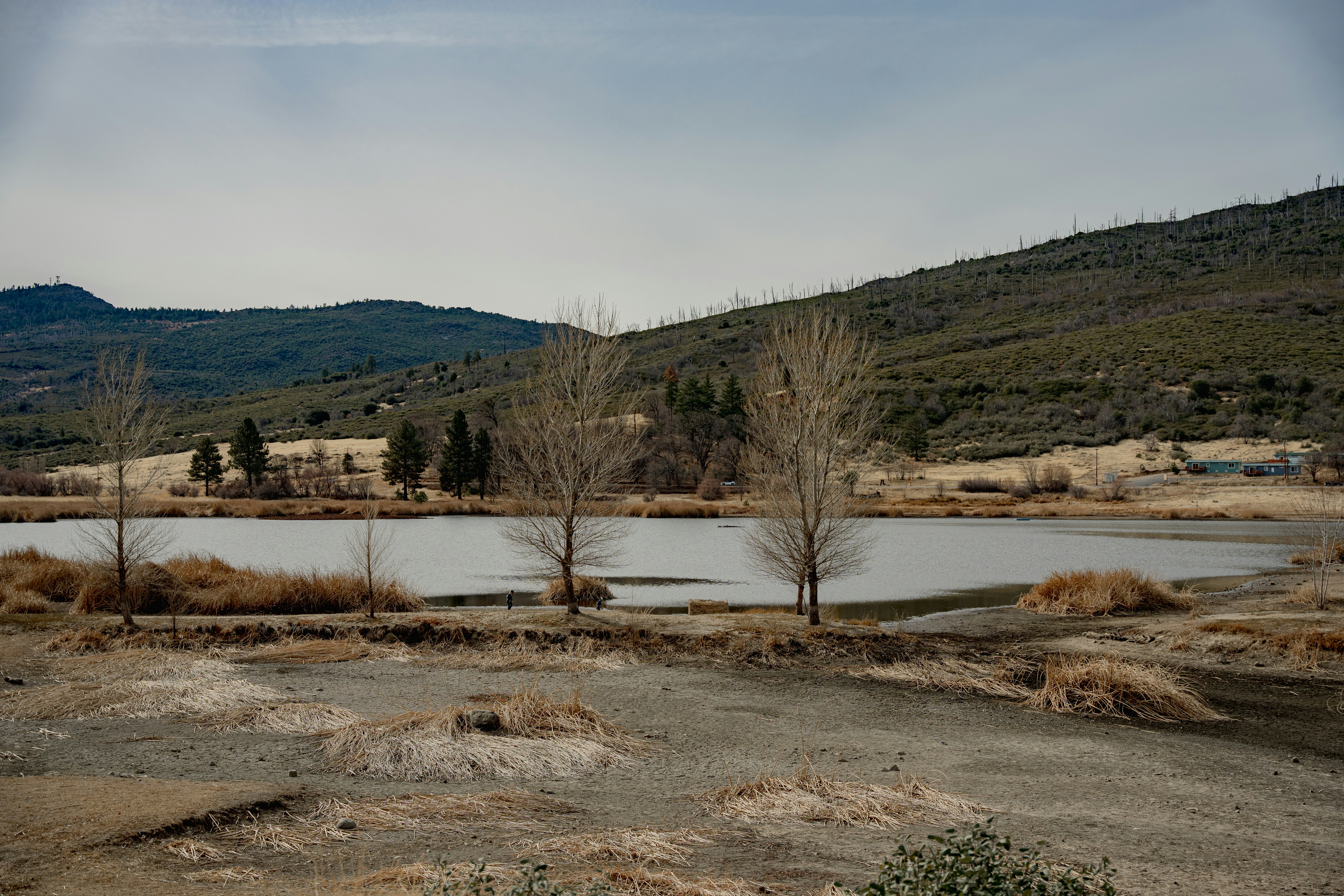 A large body of water surrounded by mountains