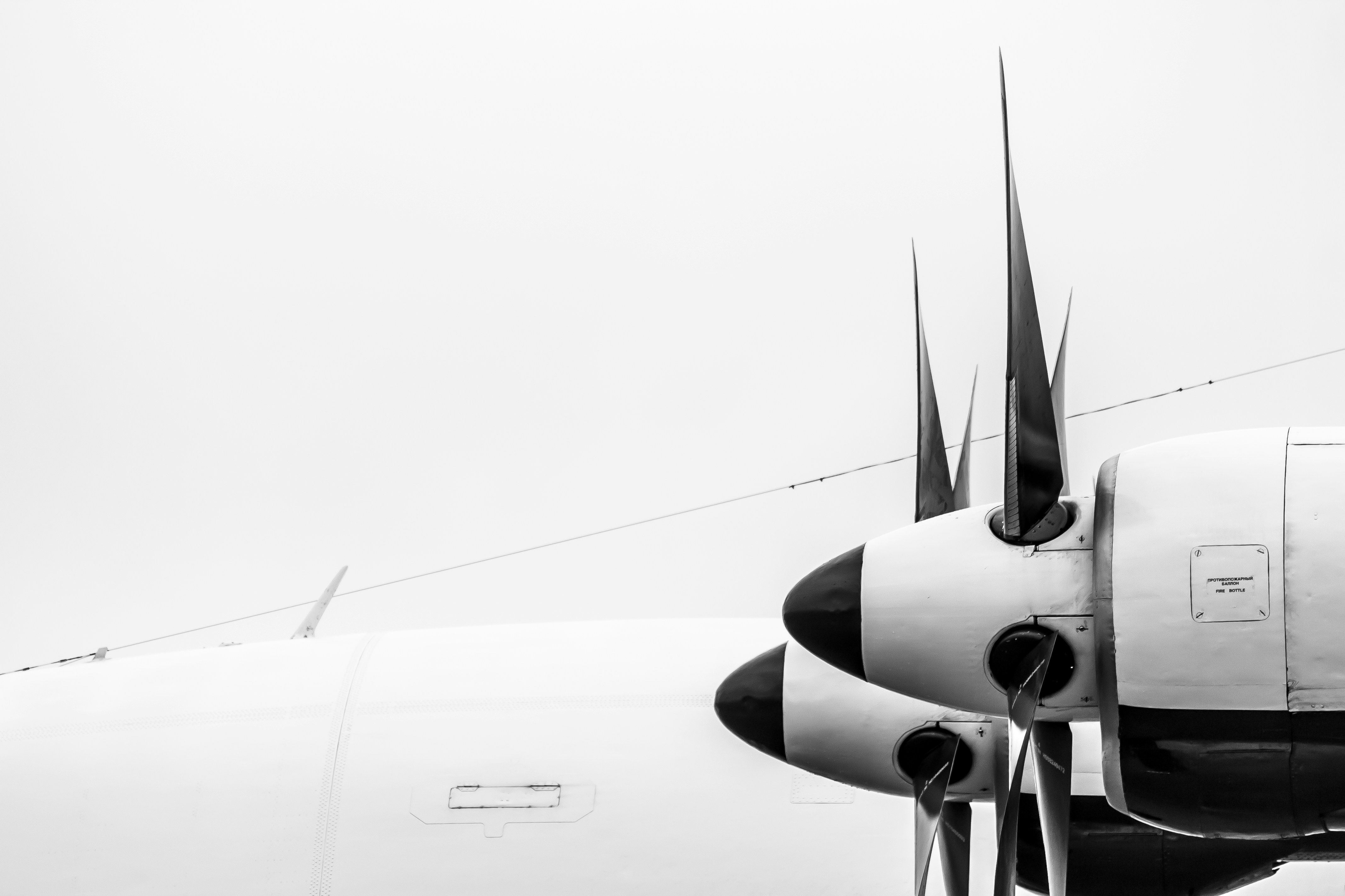 A large jetliner sitting on top of an airport tarmac, 